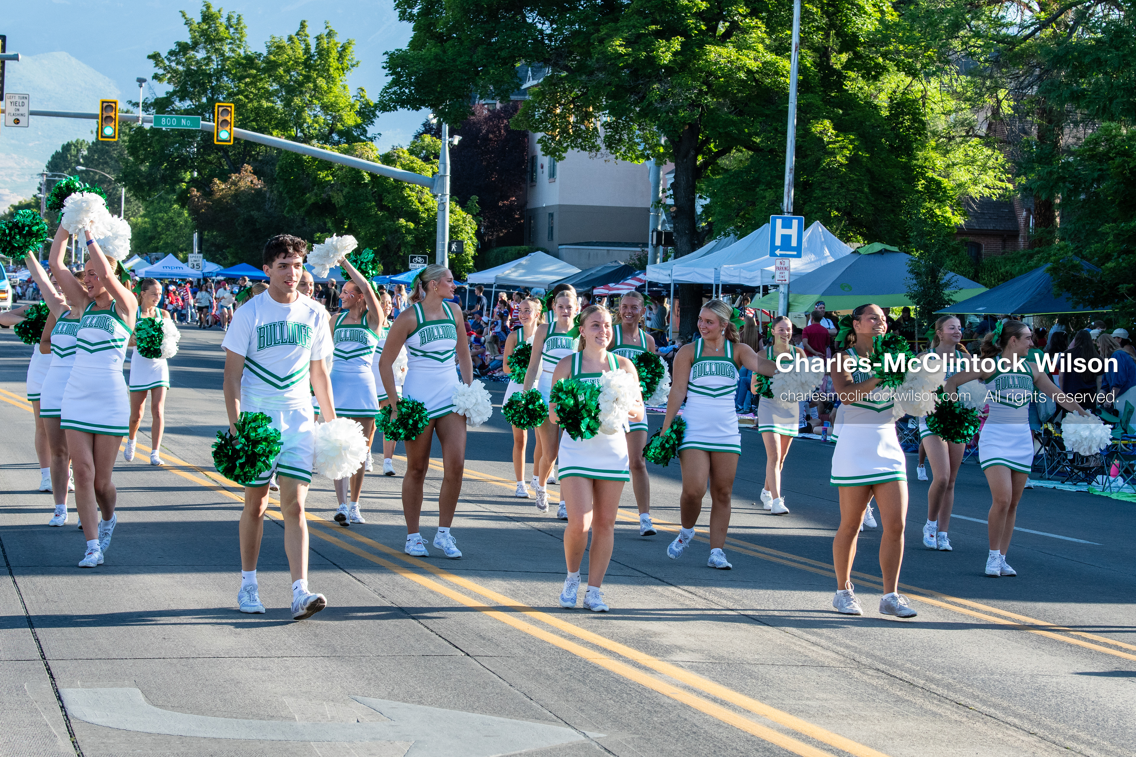 July 4, 2026, Provo, Utah, USA: Cheerleaders holding green and white pom-poms march down the street during America's Freedom Festival Grand Parade in Provo, Utah, Saturday, July 4, 2026. The annual Independence Day event features expanded programming to honor the 250th anniversary of United States independence. (Credit Image: © Charles-McClintock Wilson/ZUMA Press Wire)