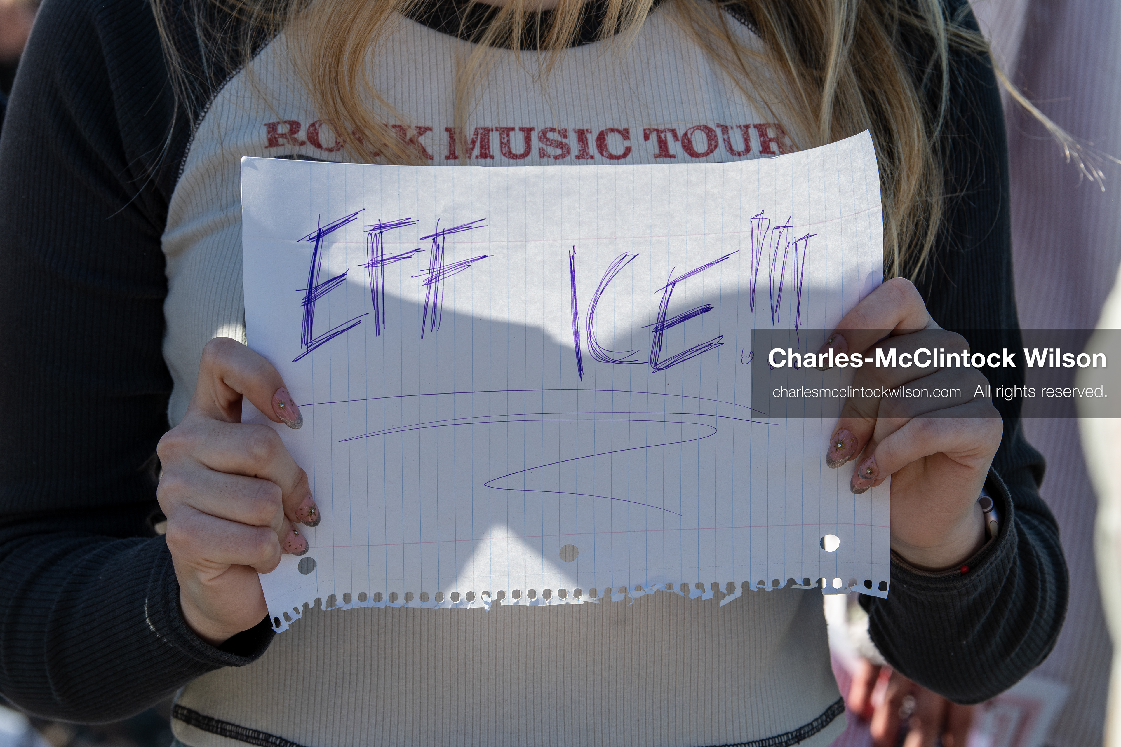 February 5, 2026, Provo, Utah, USA: A demonstrator holds a sign during a gathering near Brigham Young University in Provo where students and community members protested the presence of US Customs and Border Protection recruiters at a career fair held on the BYU campus. (Credit Image: © Charles McClintock Wilson/ZUMA Press Wire)