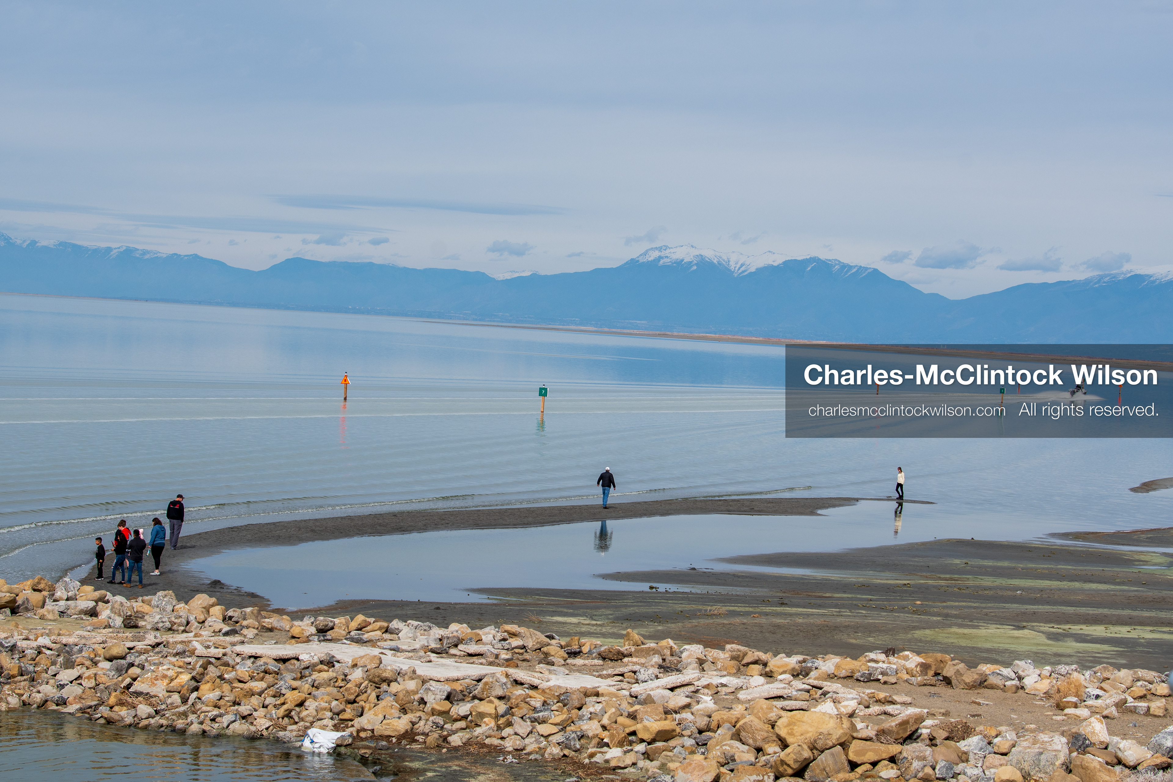 March 1, 2026, Great Salt Lake, Utah, USA: People walk along the shoreline of the Great Salt Lake as water levels remain historically low. Reports from state officials and the Great Salt Lake Strike Team state that the lake continues to fall within a serious adverse‑effects range, with elevations among the lowest recorded in more than one hundred years. The lake has drawn increased public attention as lawmakers consider large‑scale water projects and long‑term plans to address declining conditions. (Credit Image: © Charles‑McClintock Wilson/ZUMA Press Wire)