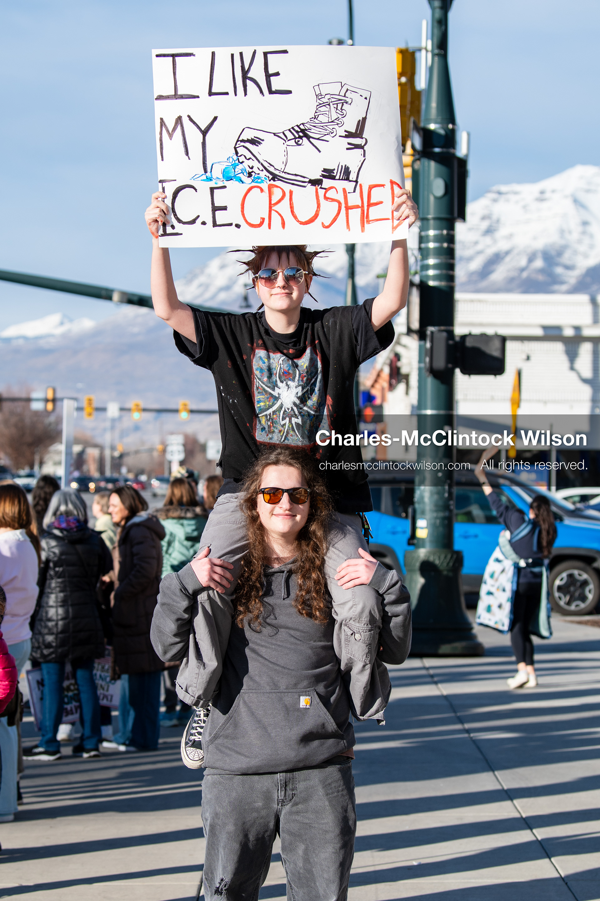  January 20, 2026, Provo, Utah, USA: A demonstrator stands outside Provo City Hall during the Free America Walkout protest in Provo Utah on January 20 2026. The nationwide event called for immigration reform and changes to detention practices.