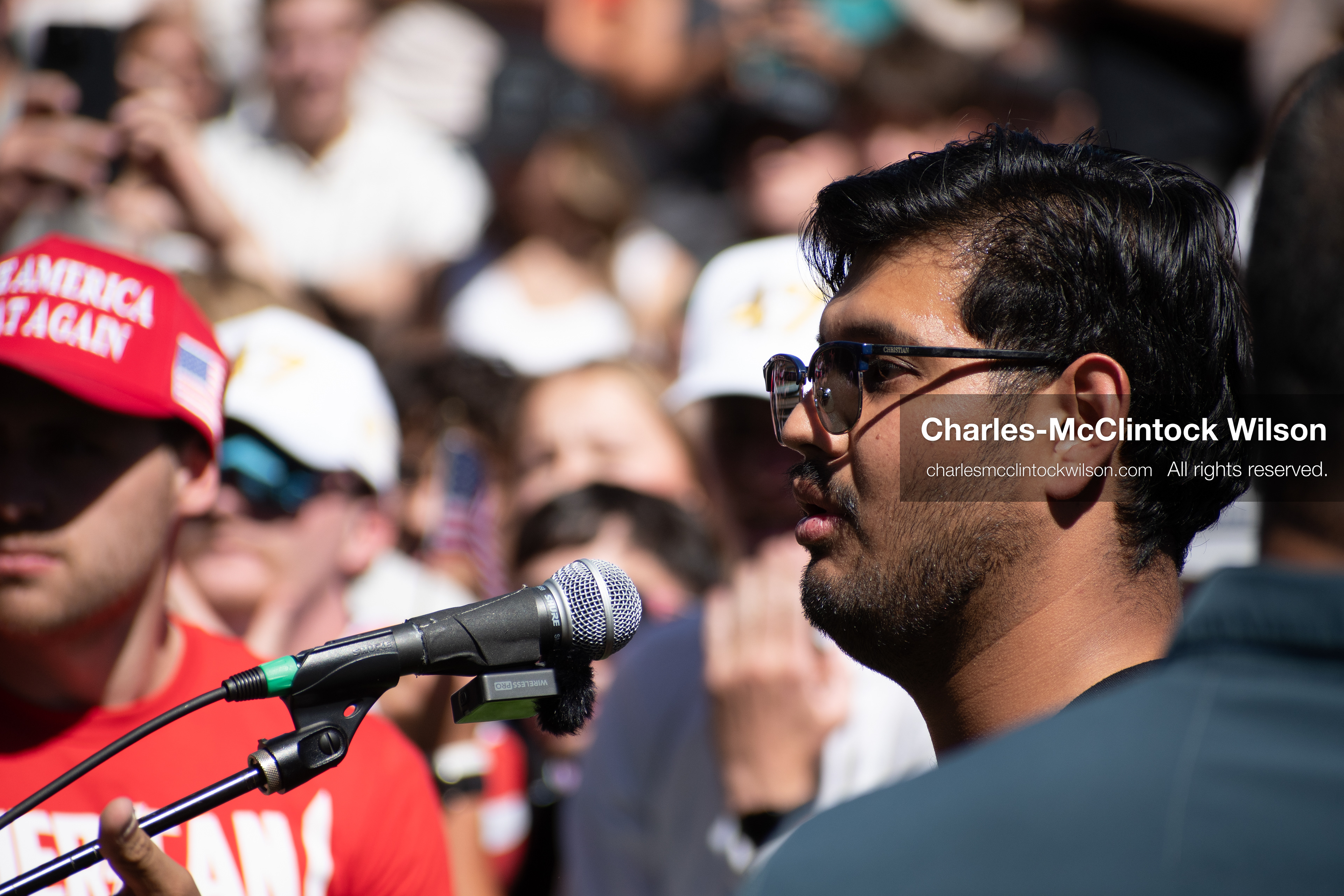 September 10, 2025, Orem, Utah, USA: A member of the audience speaks into a microphone during conservative activist Charlie Kirk’s American Comeback Tour appearance at Utah Valley University. The event was held outdoors at the Fountain Courtyard, where Kirk had requested a central, visible location. This individual was the first to ask Kirk a question during the public Q&A session, moments before Kirk was fatally shot by a sniper positioned on a nearby rooftop. The incident drew national attention and prompted scrutiny of campus security protocols. (Credit Image: © Charles‑McClintock Wilson/ZUMA Press Wire)
