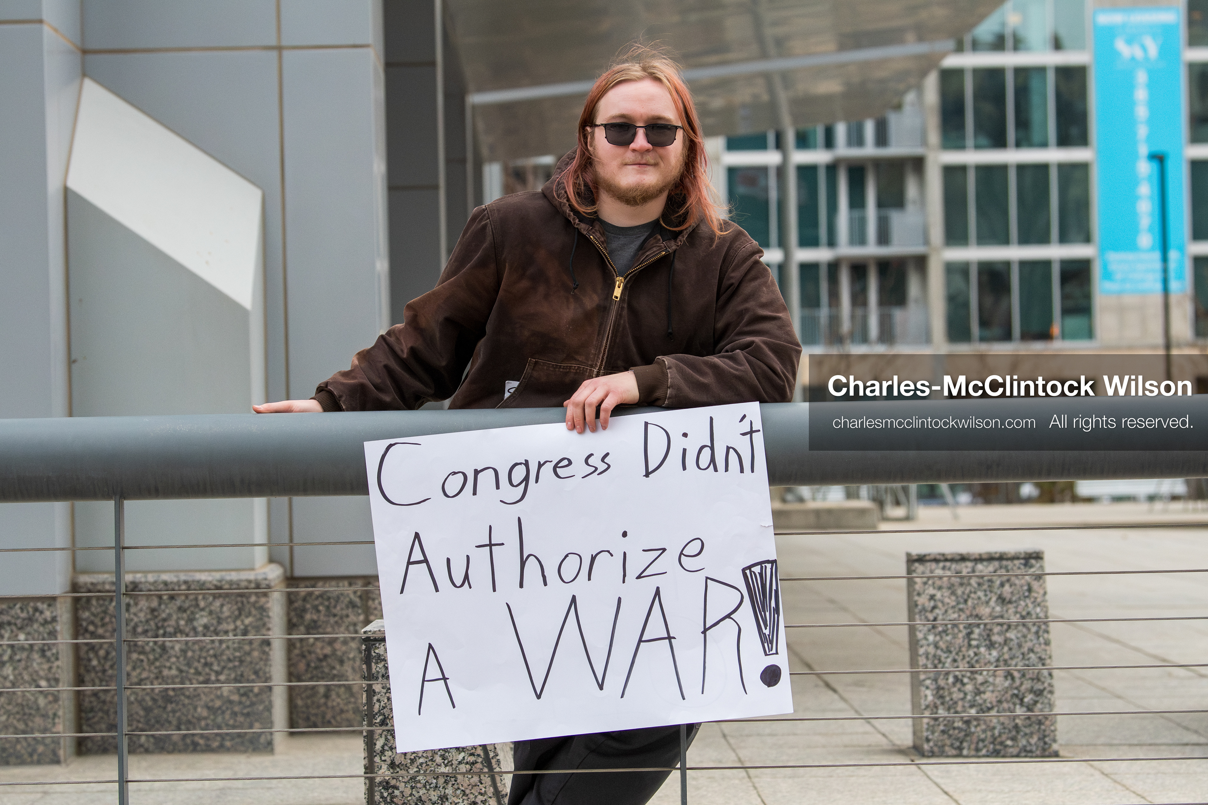 January 3, 2026, Salt Lake City, Utah, USA: A protester holds a sign during a demonstration against US action in Venezuela outside the Wallace Federal Building in Salt Lake City, Utah. The protest was part of a nationwide mobilization responding to recent military developments. (Credit Image: (c) Charles‑McClintock Wilson/ZUMA Press Wire)