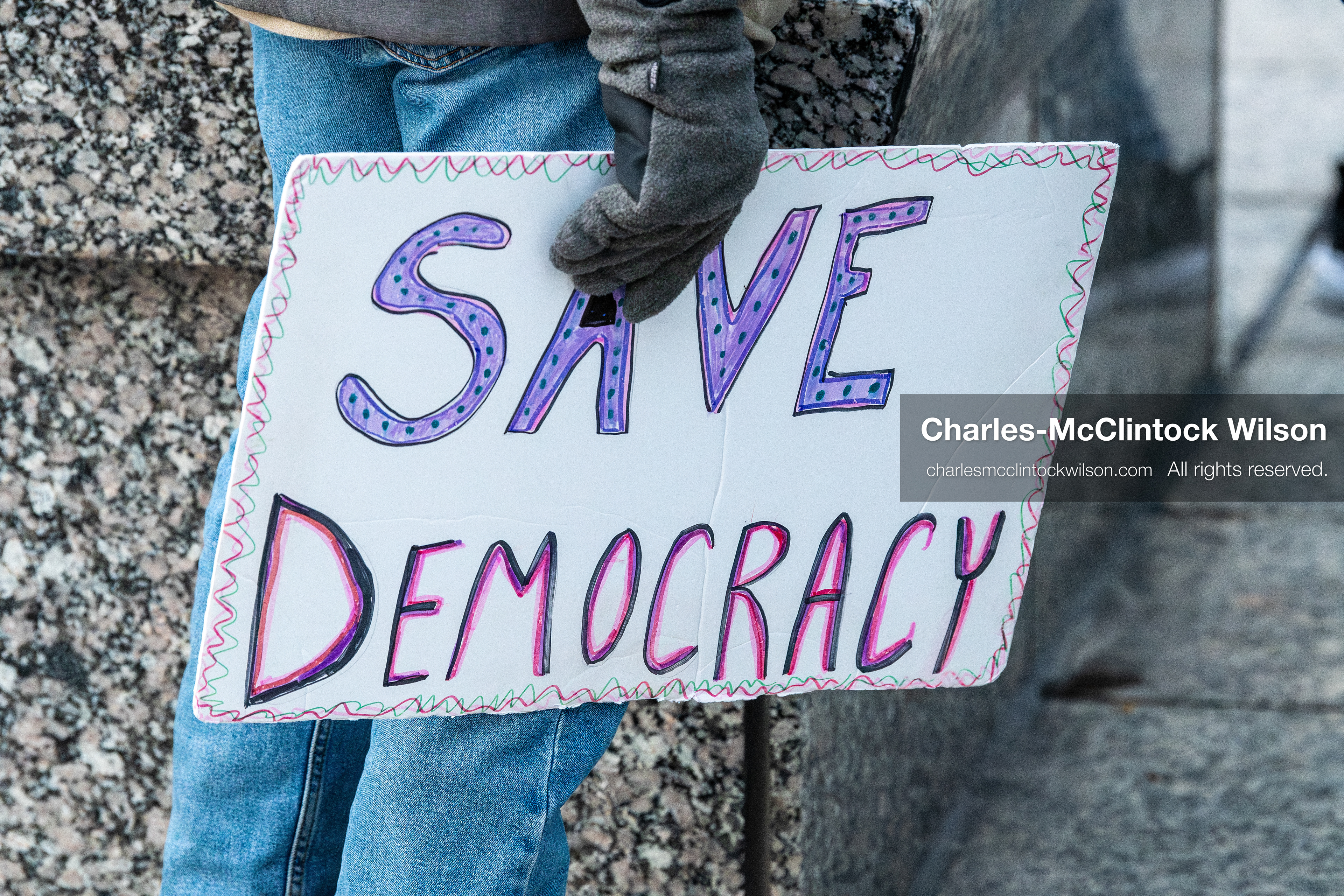 January 5, 2026, Salt Lake City, Utah, USA: A demonstrator holds a sign during a protest outside the Wallace Federal Building in Salt Lake City, Utah. The rally, organized by Salt Lake Indivisible, called for congressional limits on presidential war powers following recent US military actions in Venezuela involving the government of Nicolas Maduro. (Credit Image: (c) Charles‑McClintock Wilson/ZUMA Press Wire)