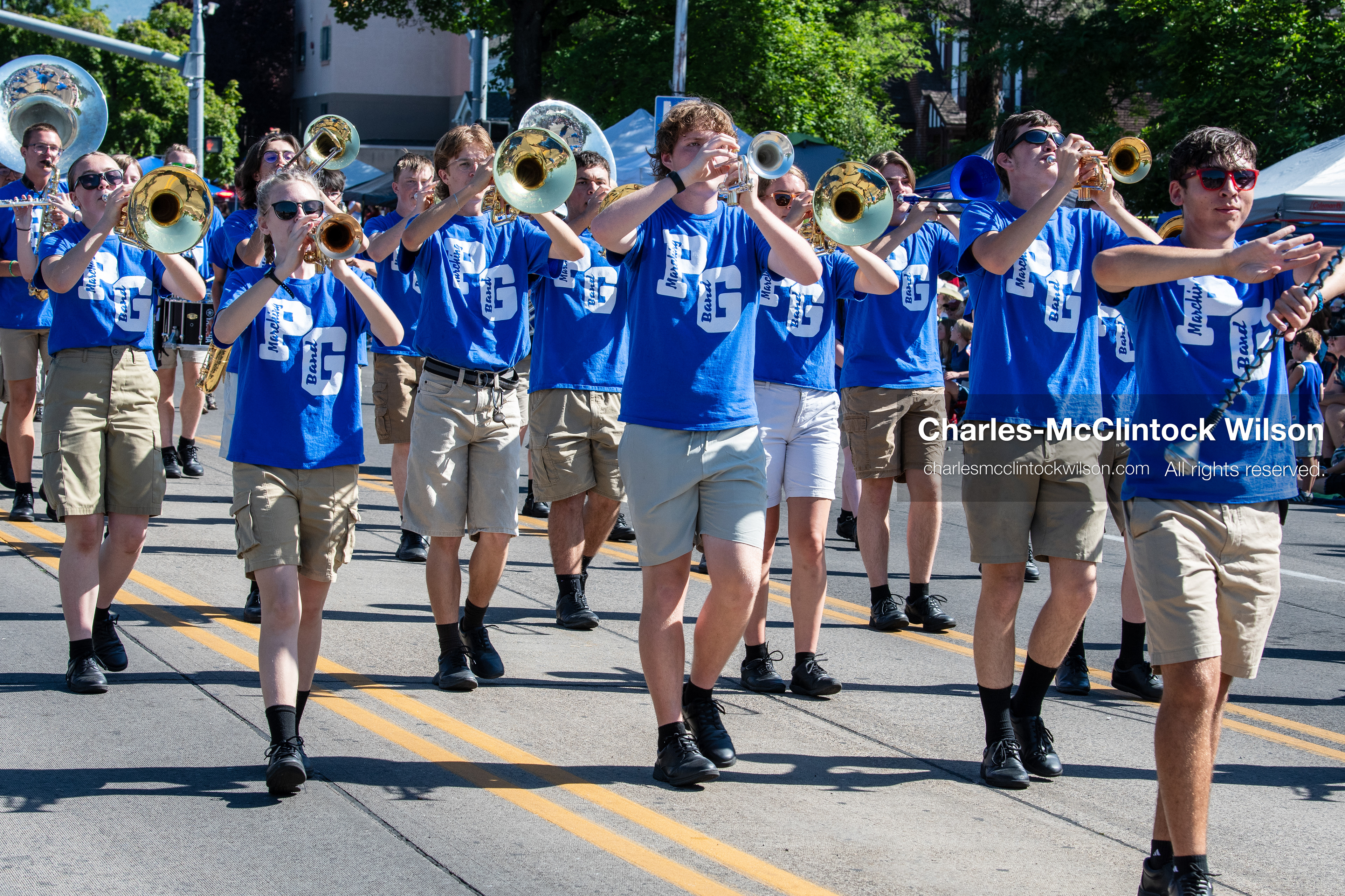 July 4, 2026, Provo, Utah, USA: Members of a high school marching band dressed in maroon and black uniforms play brass instruments while marching down the street during America's Freedom Festival Grand Parade in Provo, Utah, Saturday, July 4, 2026. The annual Independence Day event features expanded programming to honor the 250th anniversary of United States independence. (Credit Image: © Charles-McClintock Wilson/ZUMA Press Wire)