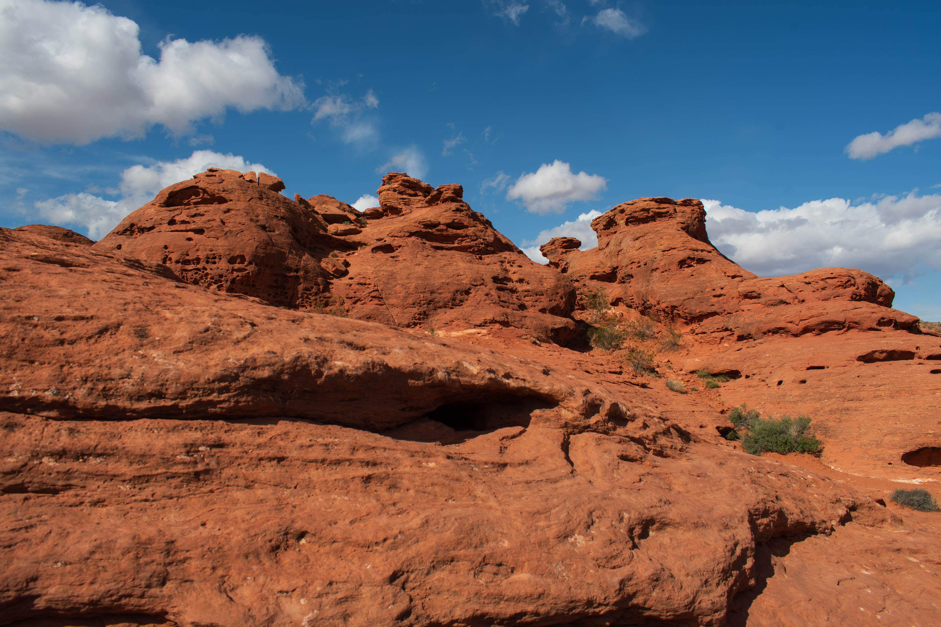 ST. GEORGE, UTAH, USA – MAY 5, 2025: Natural sandstone formations and arid terrain at Pioneer Park, a scenic public space in St. George, Utah, known for its red rock landscapes and hiking trails.