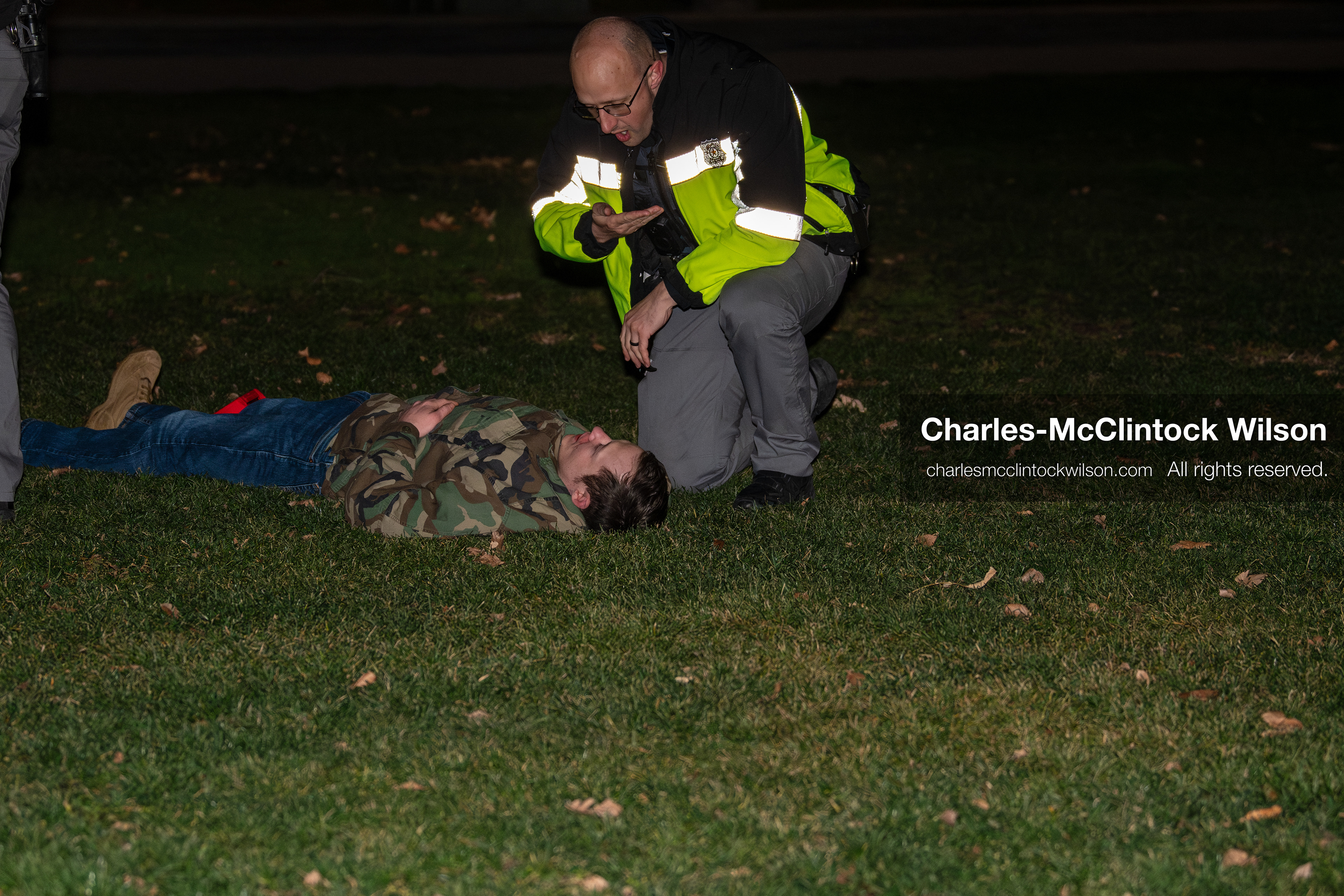 January 8, 2026, Salt Lake City, Utah, USA: A demonstrator lies on the ground after being hurt during a confrontation at an anti ICE protest at Pioneer Park in Salt Lake City Utah on Jan 8 2026. The individual is a supporter of US president Donald Trump and is being assisted by law enforcement at the scene. The rally followed the death of Renee Nicole Good during an encounter with immigration authorities in Minneapolis and drew hundreds calling for accountability and changes to enforcement practices. (Credit Image: © Charles-McClintock Wilson/ZUMA Press Wire)