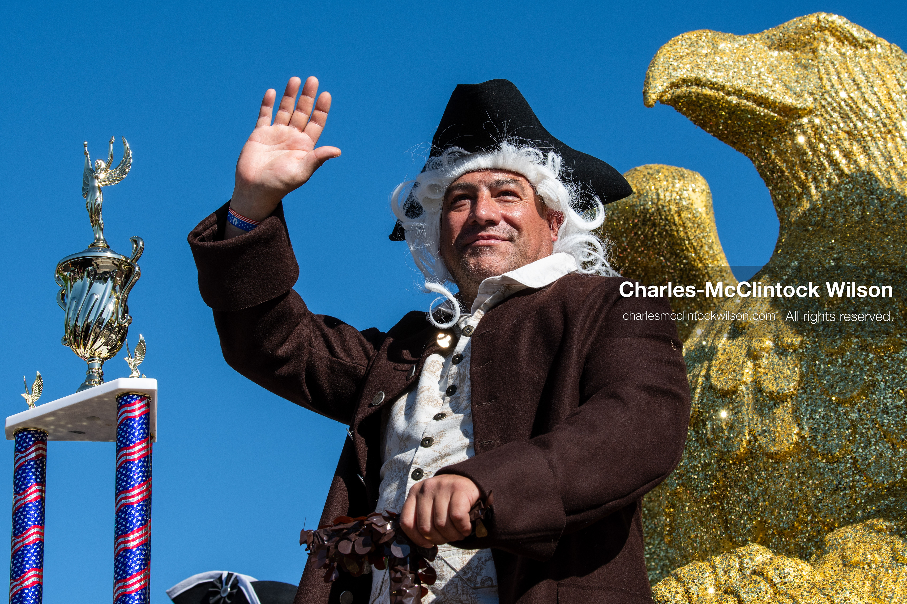 July 4, 2026, Provo, Utah, USA: A performer dressed in historical colonial attire waves to onlookers from an anniversary themed parade float during America's Freedom Festival Grand Parade in Provo, Utah, Saturday, July 4, 2026. The annual Independence Day event features expanded programming to honor the 250th anniversary of United States independence. (Credit Image: © Charles-McClintock Wilson/ZUMA Press Wire)