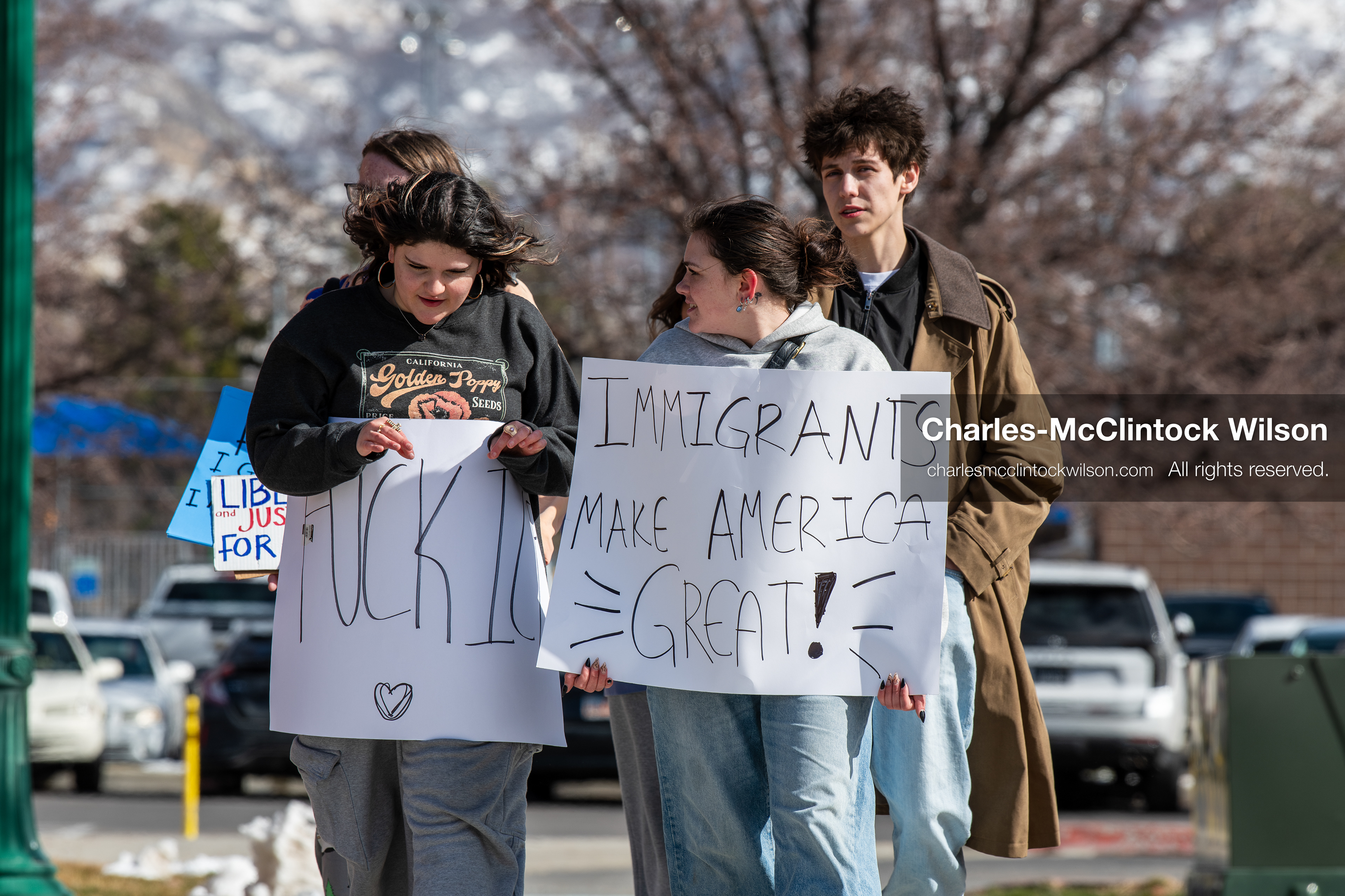 February 20, 2026, Orem, Utah, USA: Participants walk together during a student led protest against ICE in front of Orem City Hall. Some carry signs as the group moves along State Street during the event. (Credit Image: © Charles McClintock Wilson/ZUMA Press Wire)