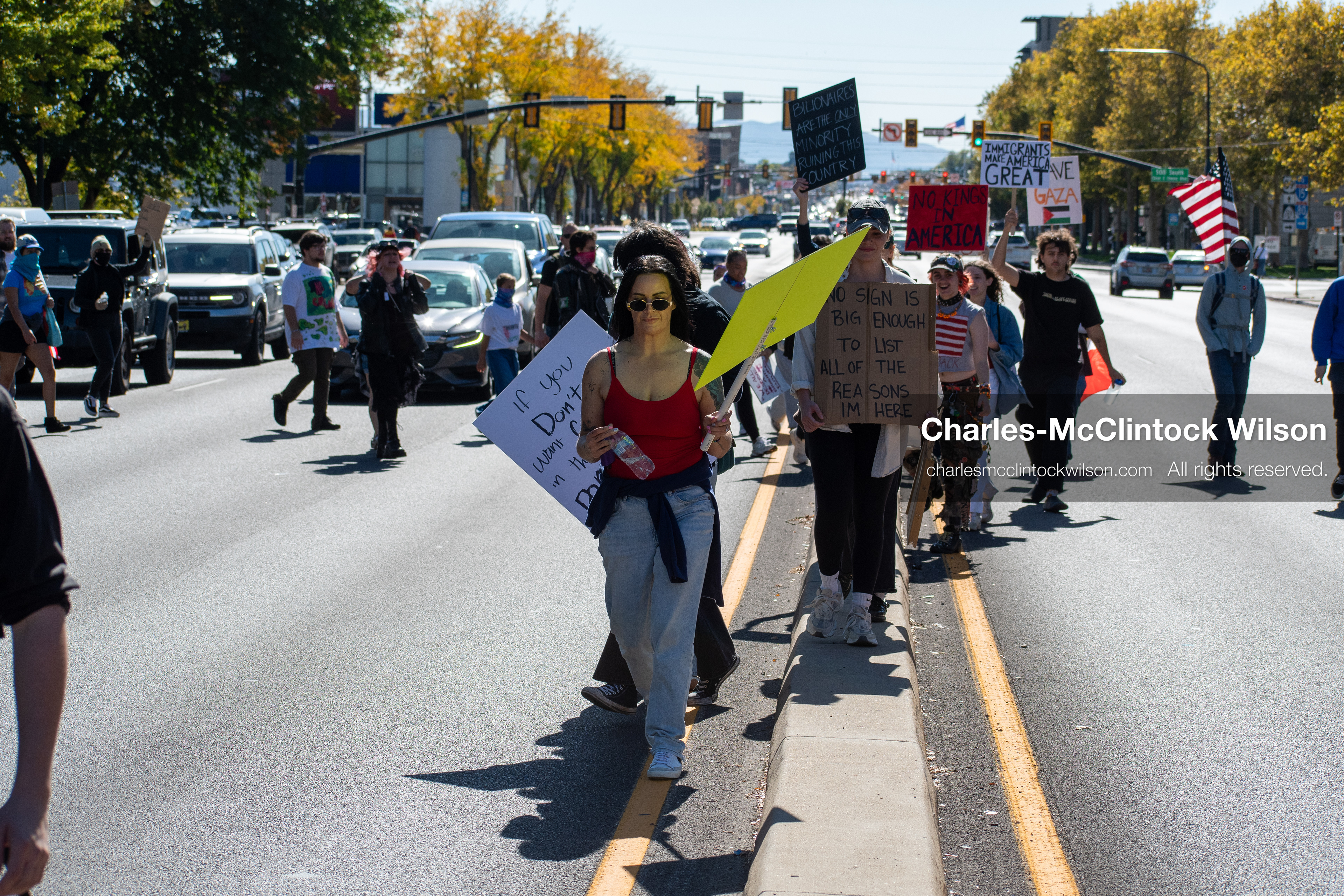 October 18, 2025, Salt Lake City, Utah, USA: Demonstrators march along South State Street during a "No Kings" protest in Salt Lake City, Utah. The protest was part of a nationwide mobilization.