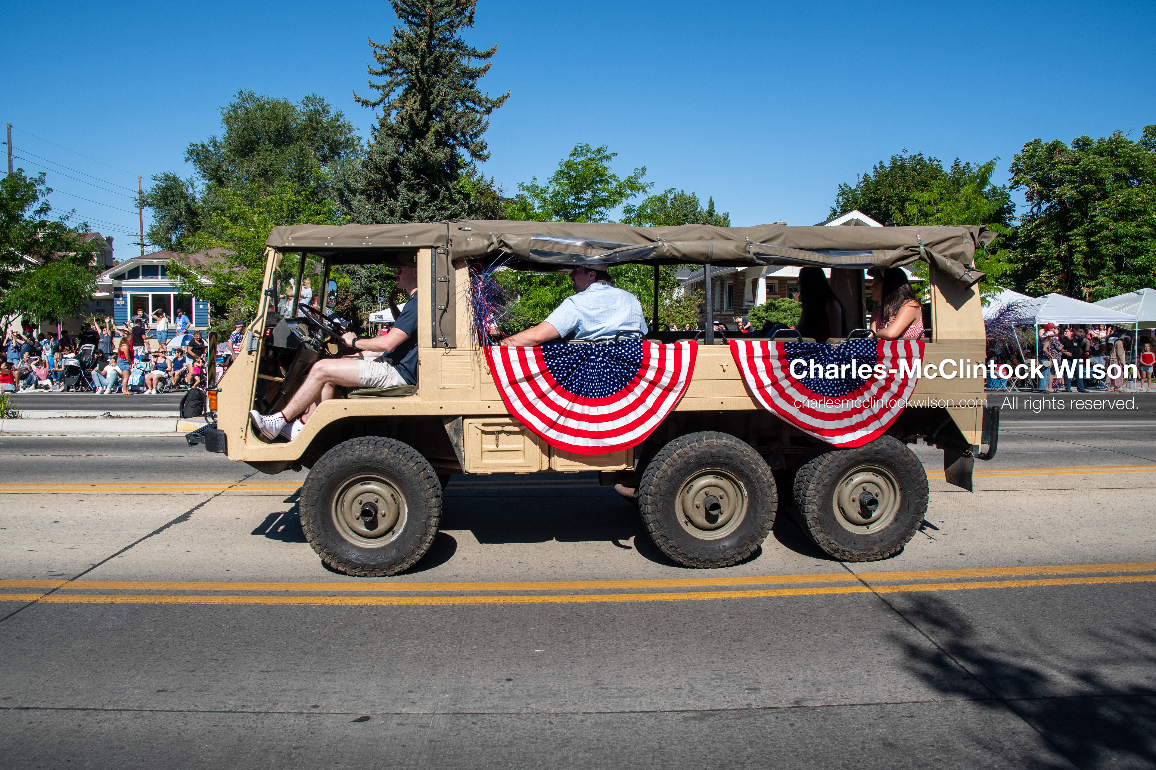 July 4, 2026, Provo, Utah, USA: A vintage six-wheeled Pinzgauer military utility vehicle decorated with patriotic bunting bunting flags drives down the street during America's Freedom Festival Grand Parade in Provo, Utah, Saturday, July 4, 2026. The annual Independence Day event features expanded programming to honor the 250th anniversary of United States independence. (Credit Image: © Charles-McClintock Wilson/ZUMA Press Wire)