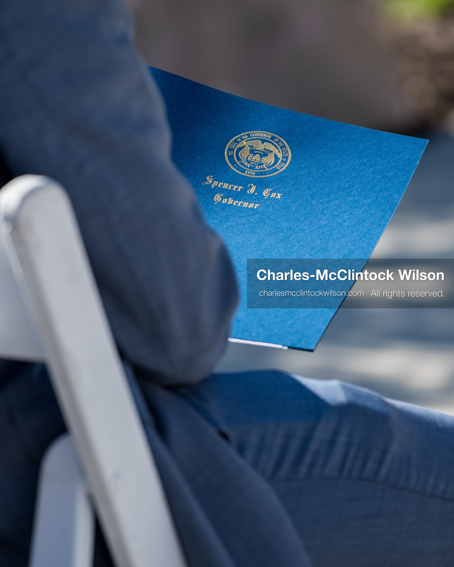 May 28, 2026, Lehi, Utah, USA: Utah Governor SPENCER COX holds a blue folder embossed with the Utah state seal during the opening of Innovation Park at Holbrook Farms and the Lehi Rippy Literacy Center on May 28 2026 in Lehi Utah. (Credit Image: © Charles-McClintock Wilson/ZUMA Press Wire)