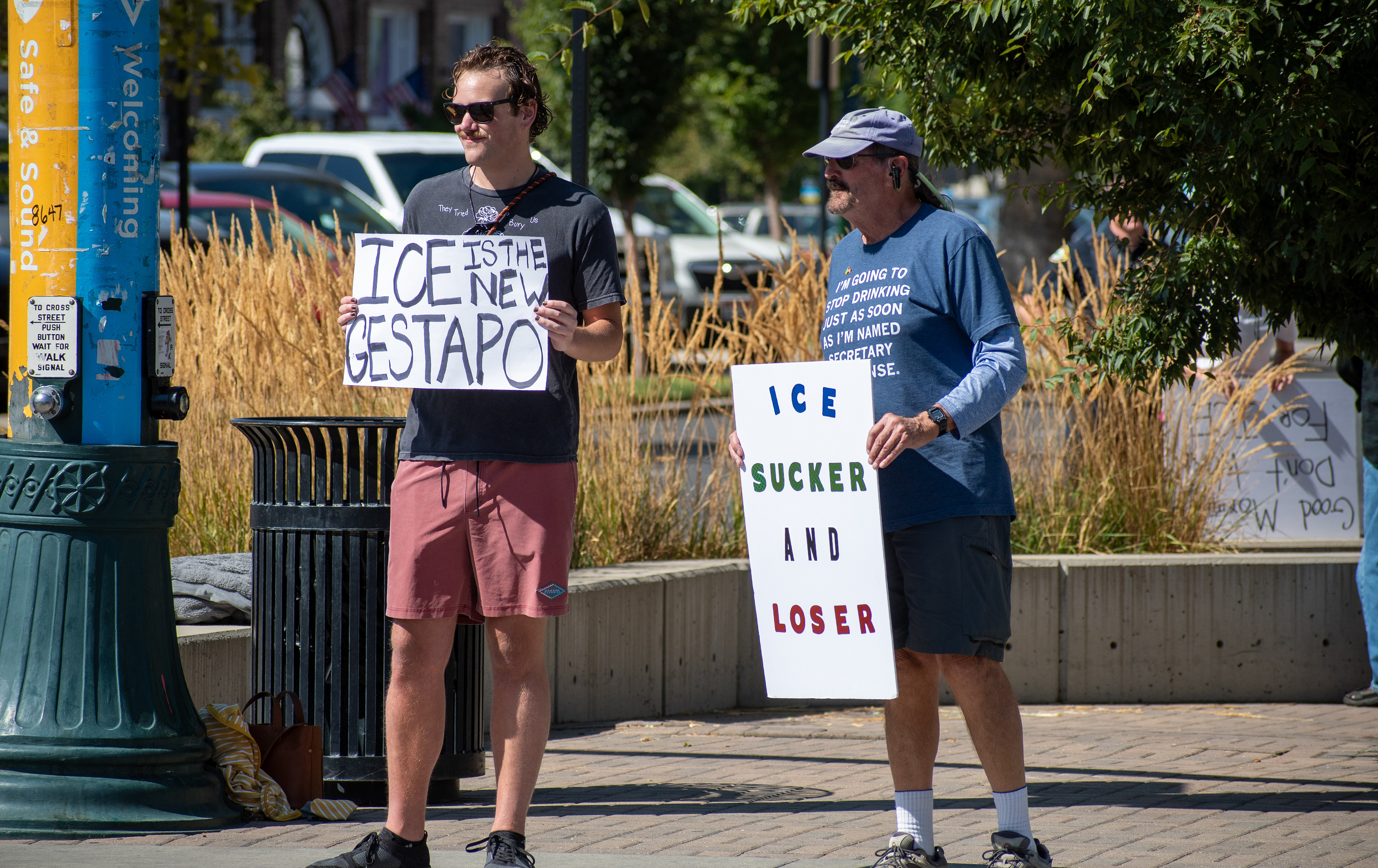 September 15, 2025 – Provo, Utah, United States: Demonstrators hold signs outside the Utah Valley Convention Center during a protest against the Department of Homeland Security career expo, voicing opposition to federal policing and immigration enforcement. Photograph by Charles‑McClintock Wilson / ZUMA Press Wire
