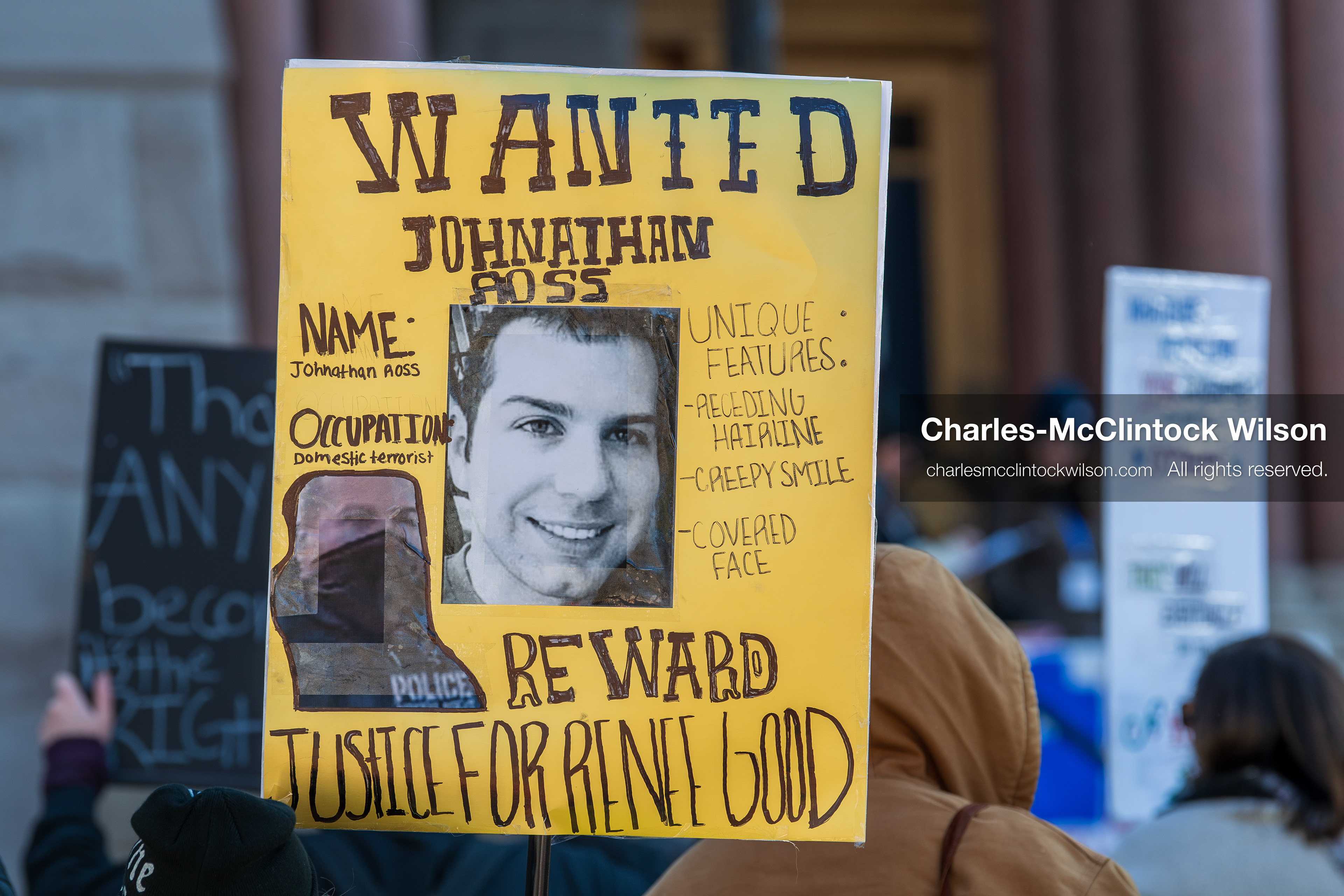 Salt Lake City, Utah, January 10, 2026: A protest sign designed to resemble a "WANTED" poster is held during the ICE Out for Good protest at Washington Square Park. The sign names Johnathan Ross — the ICE agent who fatally shot Renee Nicole Good — and calls for justice. (Credit Image: © Charles‑McClintock Wilson/ZUMA Press Wire)