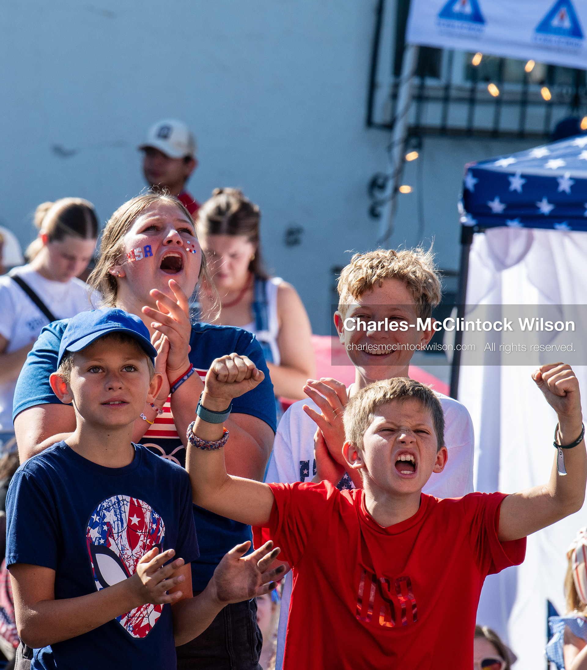 July 4, 2026, Provo, Utah, USA: Spectators cheer and wave from the sidewalk during America's Freedom Festival Grand Parade in Provo, Utah, Saturday, July 4, 2026. The annual event drew thousands of spectators to the downtown corridor. (Credit Image: © Charles-McClintock Wilson/ZUMA Press Wire)