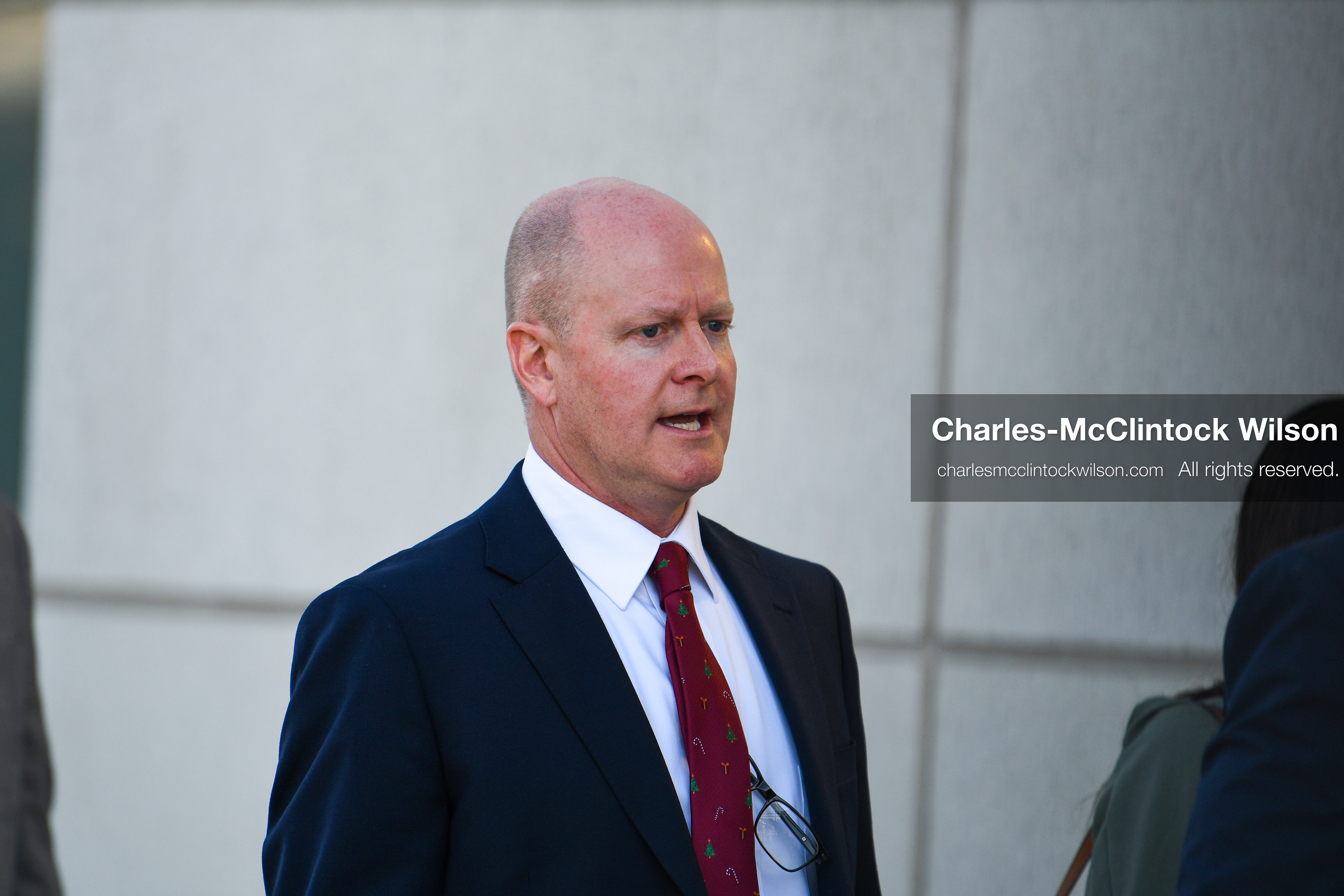 PROVO, UTAH, USA – DECEMBER 11, 2025: Chad Grunander, center, a prosecutor with the Utah County Attorney’s Office, arrives at the Fourth District Court in Provo for the first in‑person court appearance of Tyler Robinson in the Charlie Kirk murder case. (Credit Image: © Charles‑McClintock Wilson/ZUMA Press Wire)