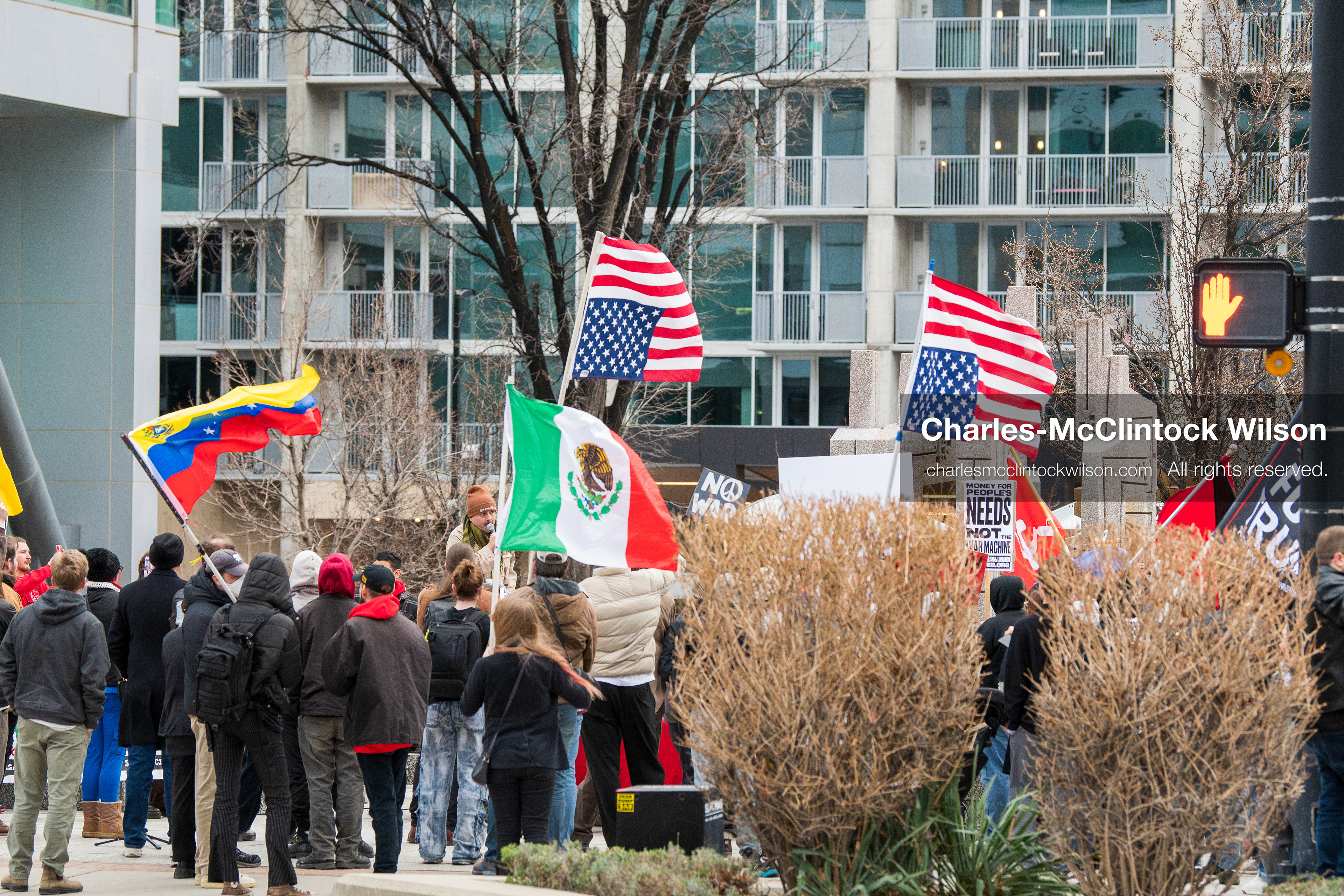 January 3, 2026, Salt Lake City, Utah, USA: Protesters hold signs during an emergency demonstration against US action in Venezuela outside the Wallace Federal Building in Salt Lake City, Utah. The event was part of a nationwide mobilization responding to recent military developments. (Credit Image: (c) Charles‑McClintock Wilson/ZUMA Press Wire)