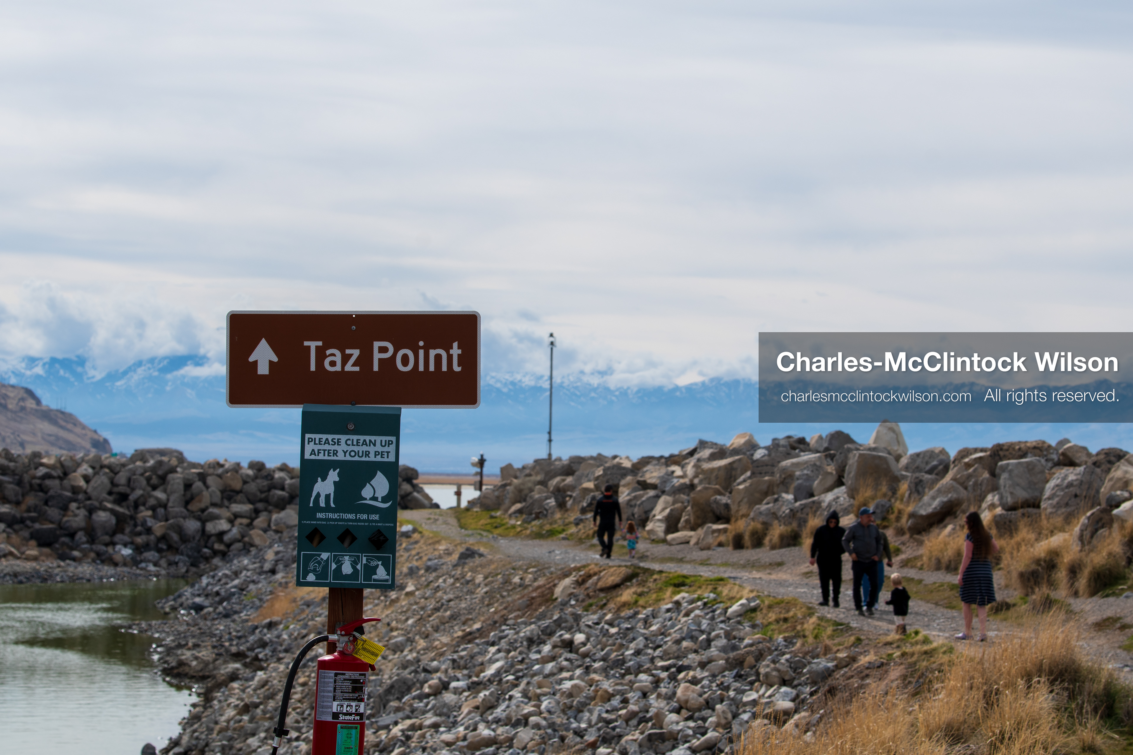 March 1, 2026, Great Salt Lake, Utah, USA: People walk along a path near the Great Salt Lake at a trail access point as water levels in the region remain historically low. Reports from state officials and the Great Salt Lake Strike Team state that the lake continues to fall within a serious adverse‑effects range, with elevations among the lowest recorded in more than one hundred years. The lake has drawn increased public attention as lawmakers discuss large‑scale water projects and long‑term plans to address declining conditions. (Credit Image: © Charles‑McClintock Wilson/ZUMA Press Wire)