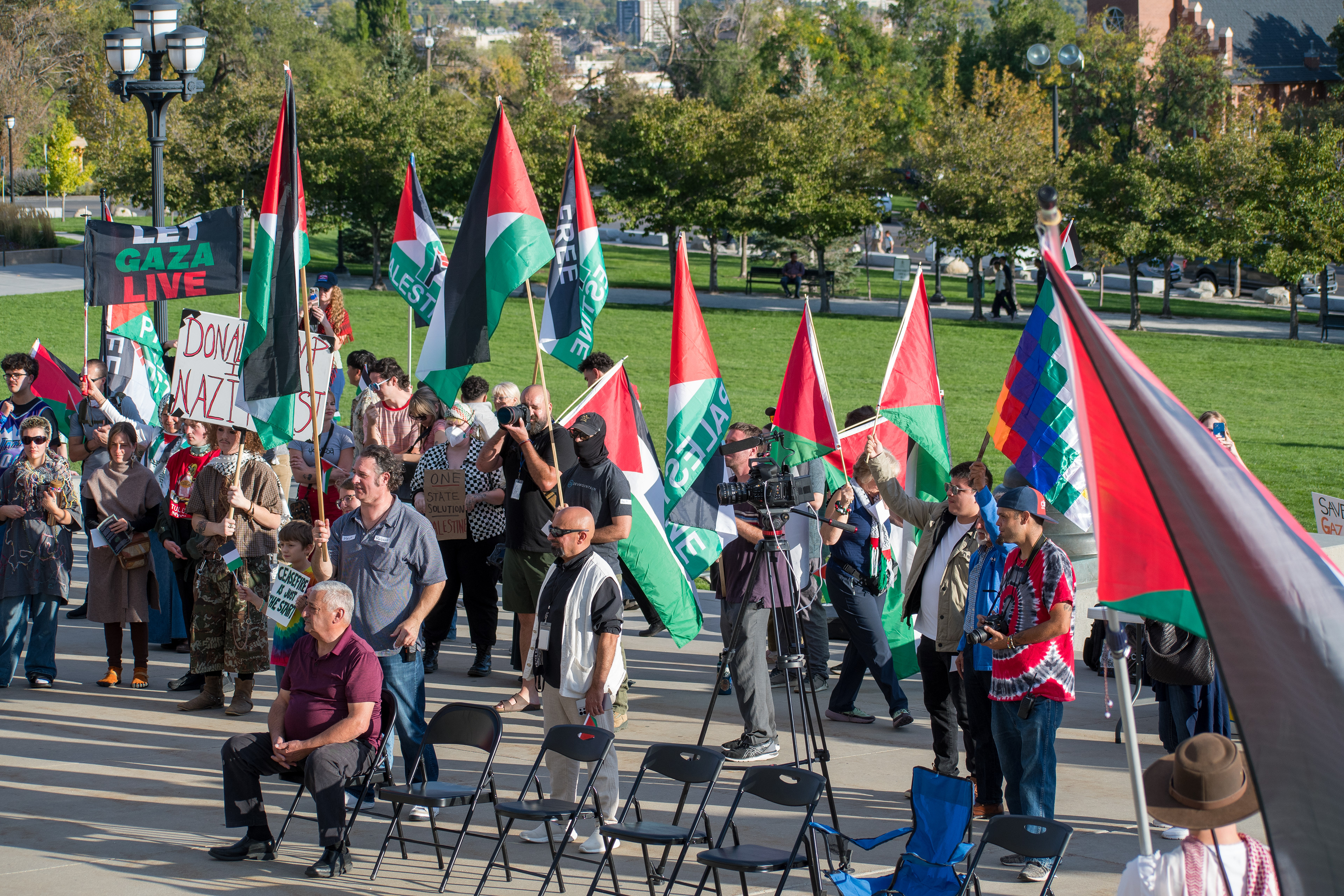 October 10, 2025, Salt Lake City, Utah, USA: Pro-Palestine demonstrators gather in front of the Utah State Capitol during the Free Palestine Rally. Participants hold flags and signs as part of the public demonstration. (Credit Image: © Charles-McClintock Wilson/ZUMA Press Wire)
