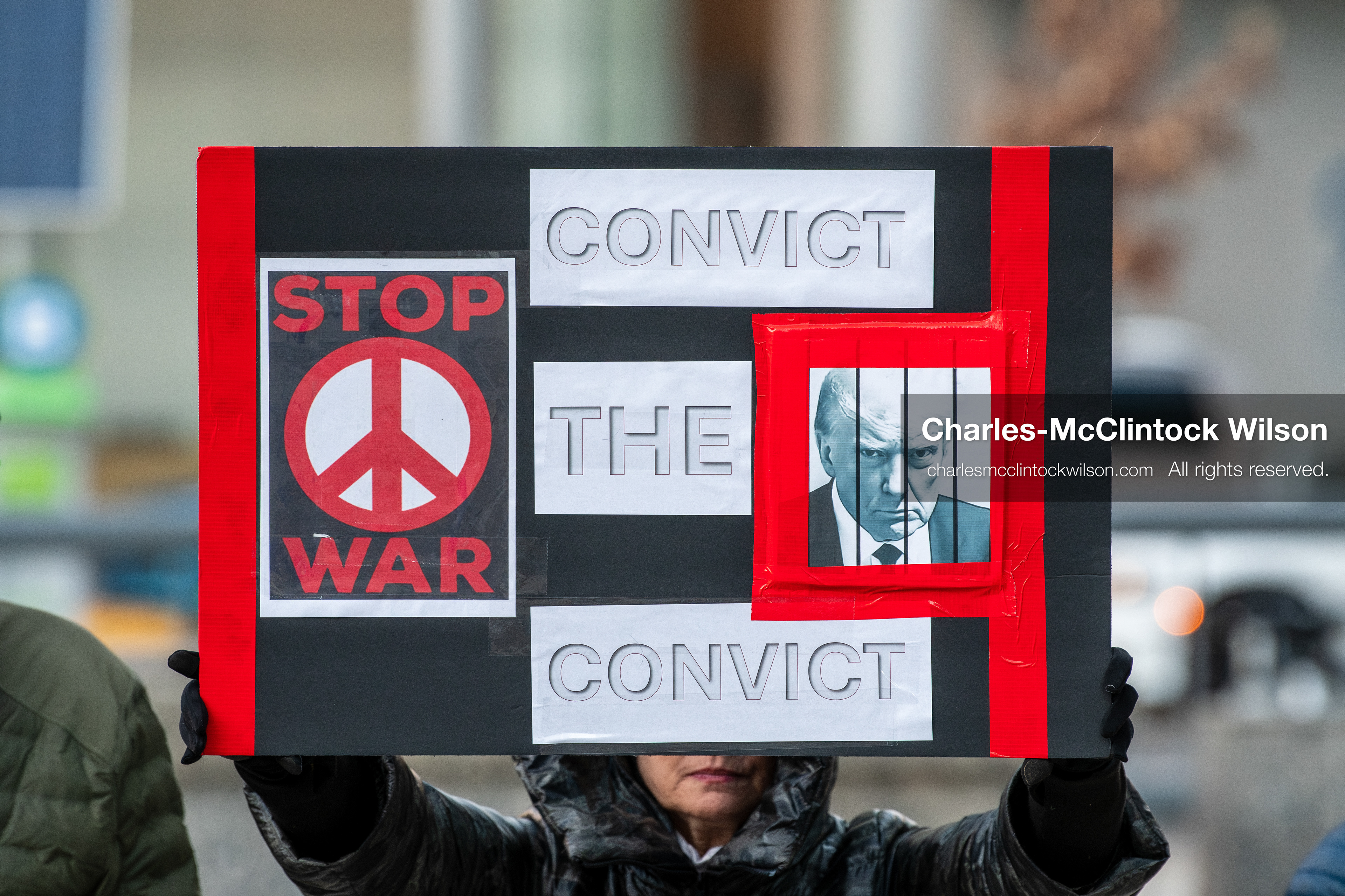 January 5, 2026, Salt Lake City, Utah, USA: A demonstrator holds a sign during a protest outside the Wallace Federal Building in Salt Lake City, Utah. The rally, organized by Salt Lake Indivisible, called for congressional limits on presidential war powers following recent US military actions in Venezuela involving the government of Nicolas Maduro. (Credit Image: (c) Charles‑McClintock Wilson/ZUMA Press Wire)
