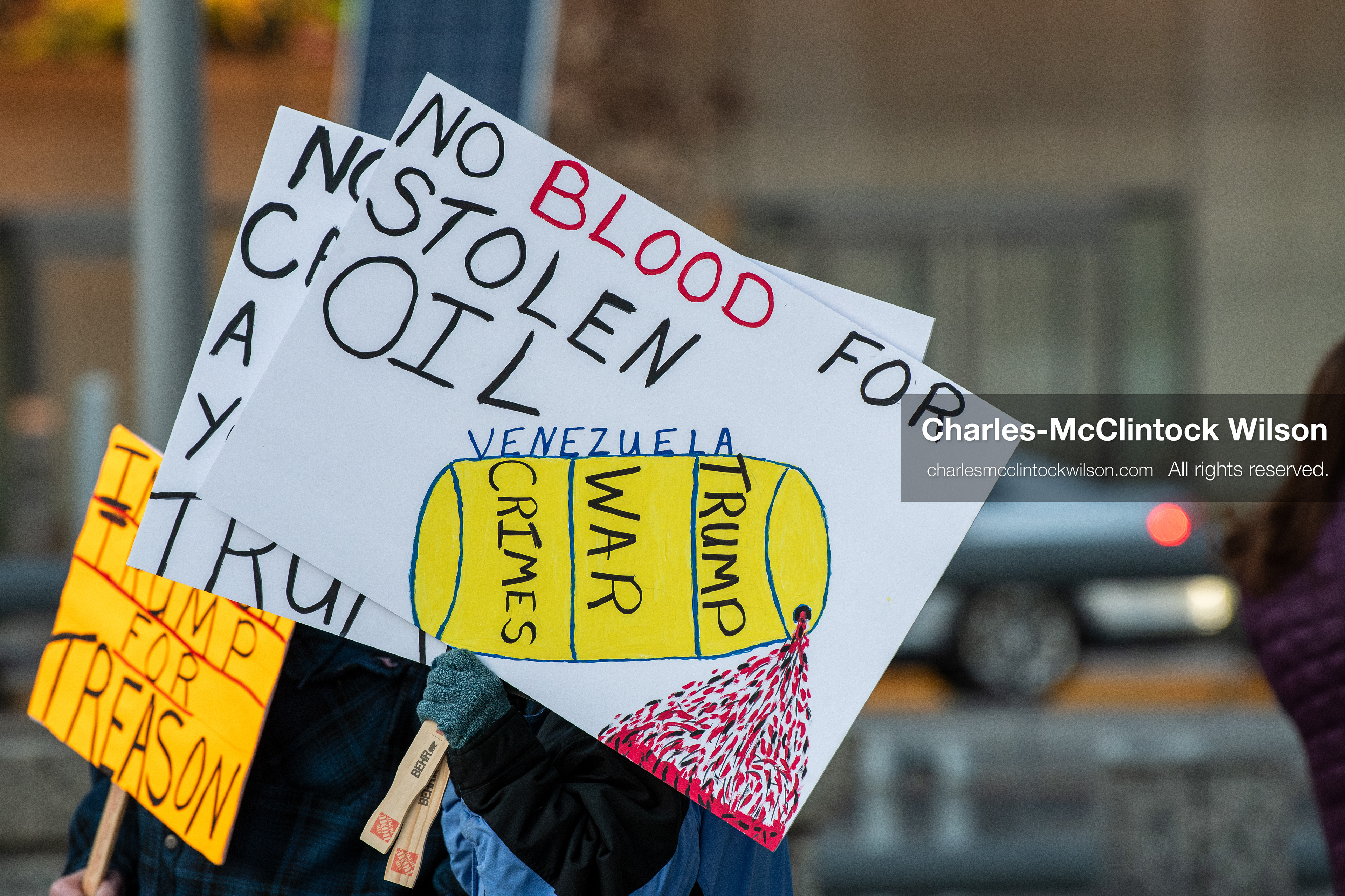January 5, 2026, Salt Lake City, Utah, USA: Demonstrators hold signs during a protest outside the Wallace Federal Building in Salt Lake City, Utah. The rally, organized by Salt Lake Indivisible, called for congressional limits on presidential war powers following recent US military actions in Venezuela involving the government of Nicolas Maduro. (Credit Image: (c) Charles‑McClintock Wilson/ZUMA Press Wire)