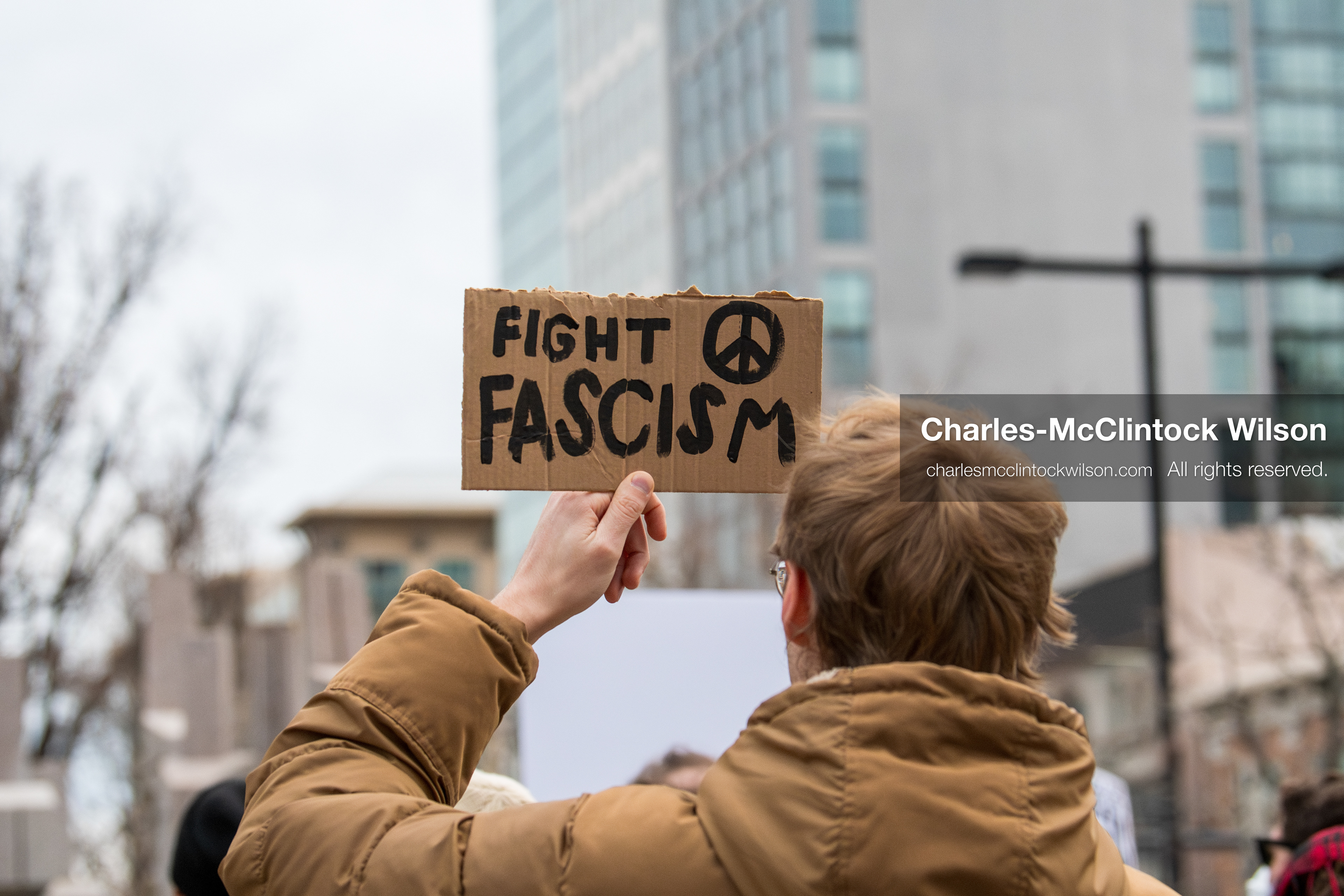 January 3, 2026, Salt Lake City, Utah, USA: A protester holds a sign during a demonstration against US action in Venezuela outside the Wallace Federal Building in Salt Lake City, Utah. The protest was part of a nationwide mobilization responding to recent military developments. (Credit Image: (c) Charles‑McClintock Wilson/ZUMA Press Wire)