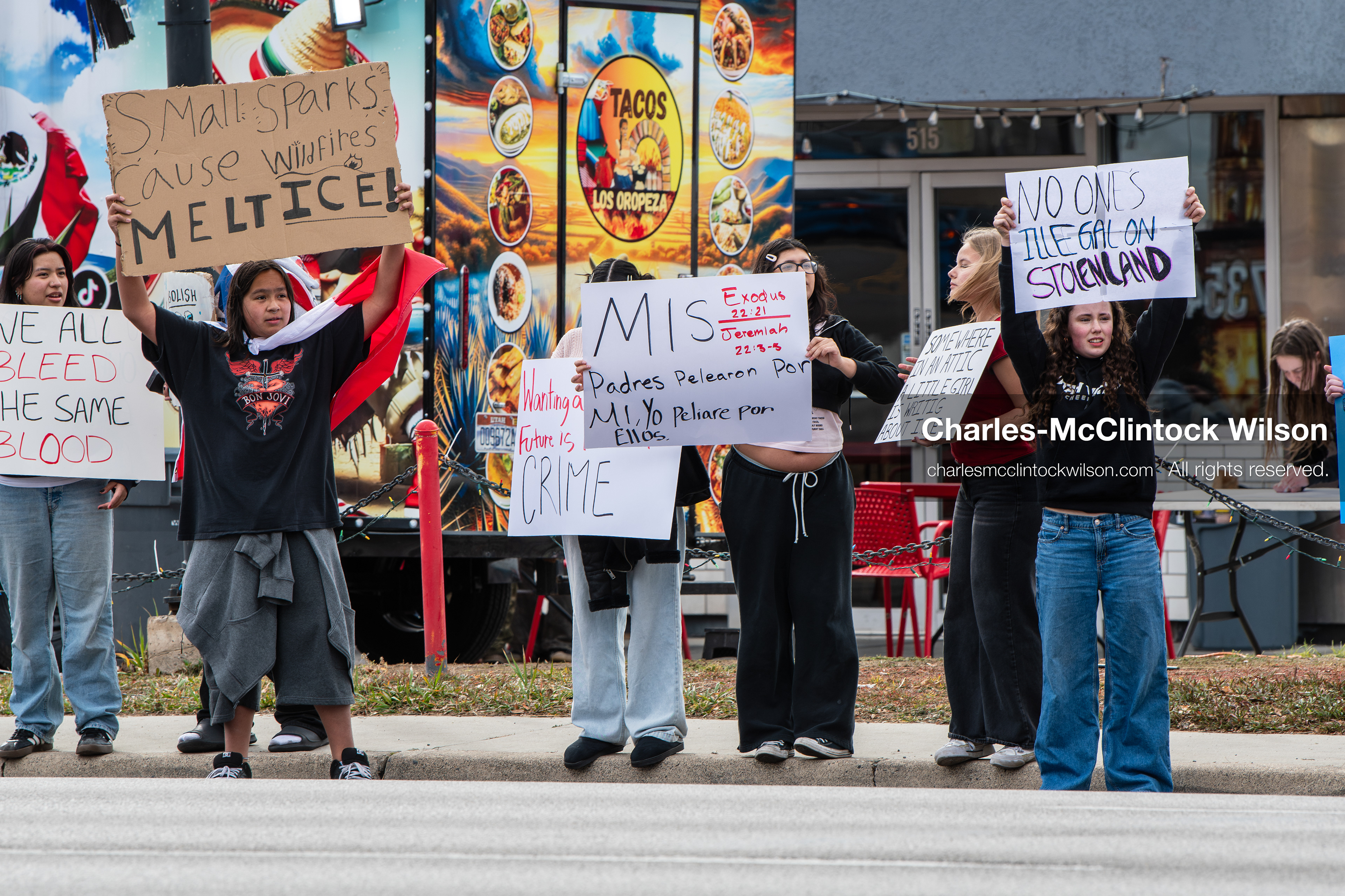 February 11, 2026, Orem, Utah, USA: Students stand on the sidewalk along State Street during a student‑led protest involving participants from multiple Orem schools. (Credit Image: © Charles‑McClintock Wilson/ZUMA Press Wire)