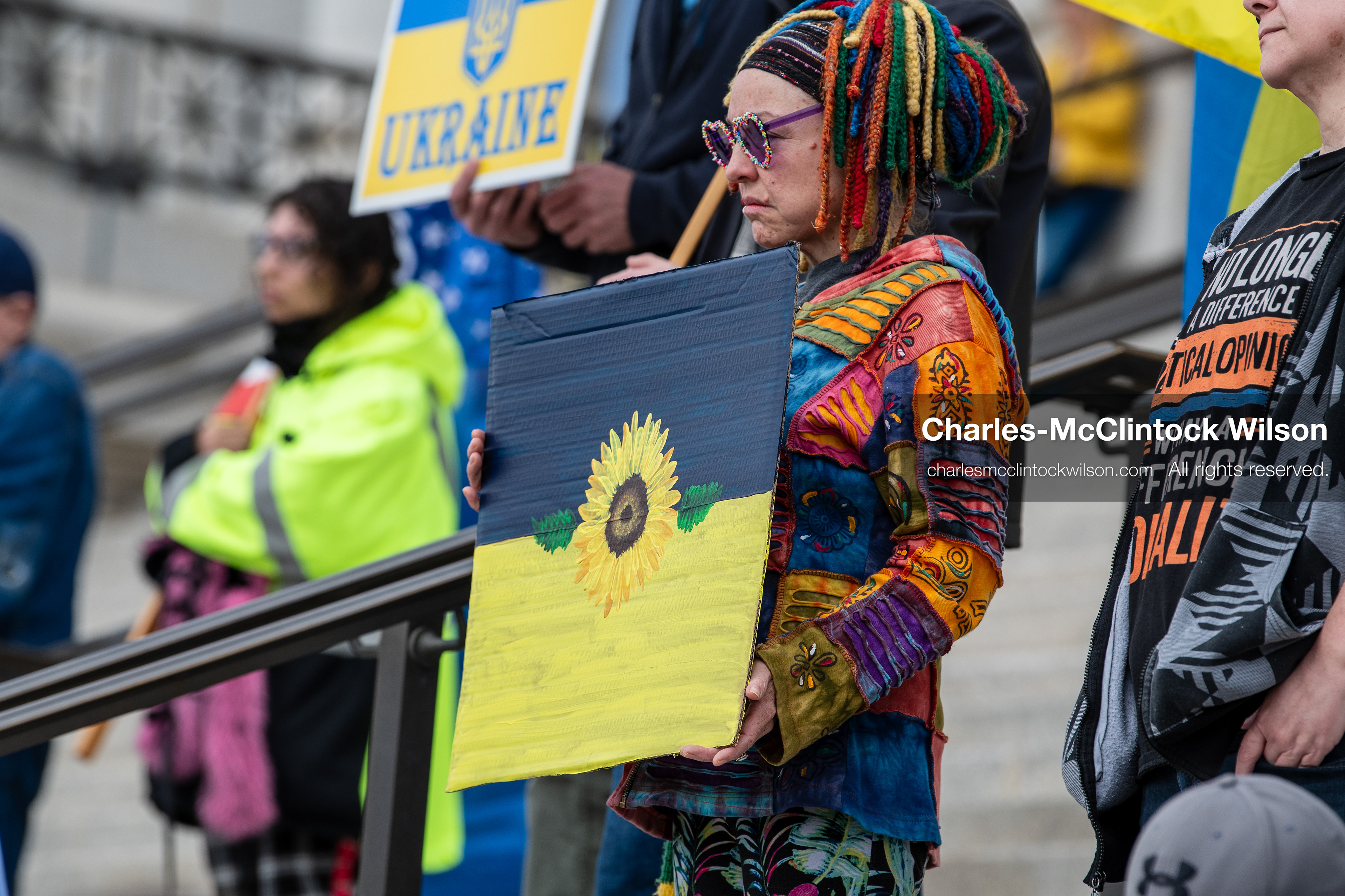 February 28, 2026, Salt Lake City, Utah, USA: Supporters gather on the steps of the Utah State Capitol during the Stand With Ukraine rally marking the four year anniversary of the full scale Russian invasion of Ukraine. Participants hold signs and Ukrainian flags as community members call for continued support for Ukraine and an end to the war. (Credit Image: © Charles McClintock Wilson/ZUMA Press Wire)
