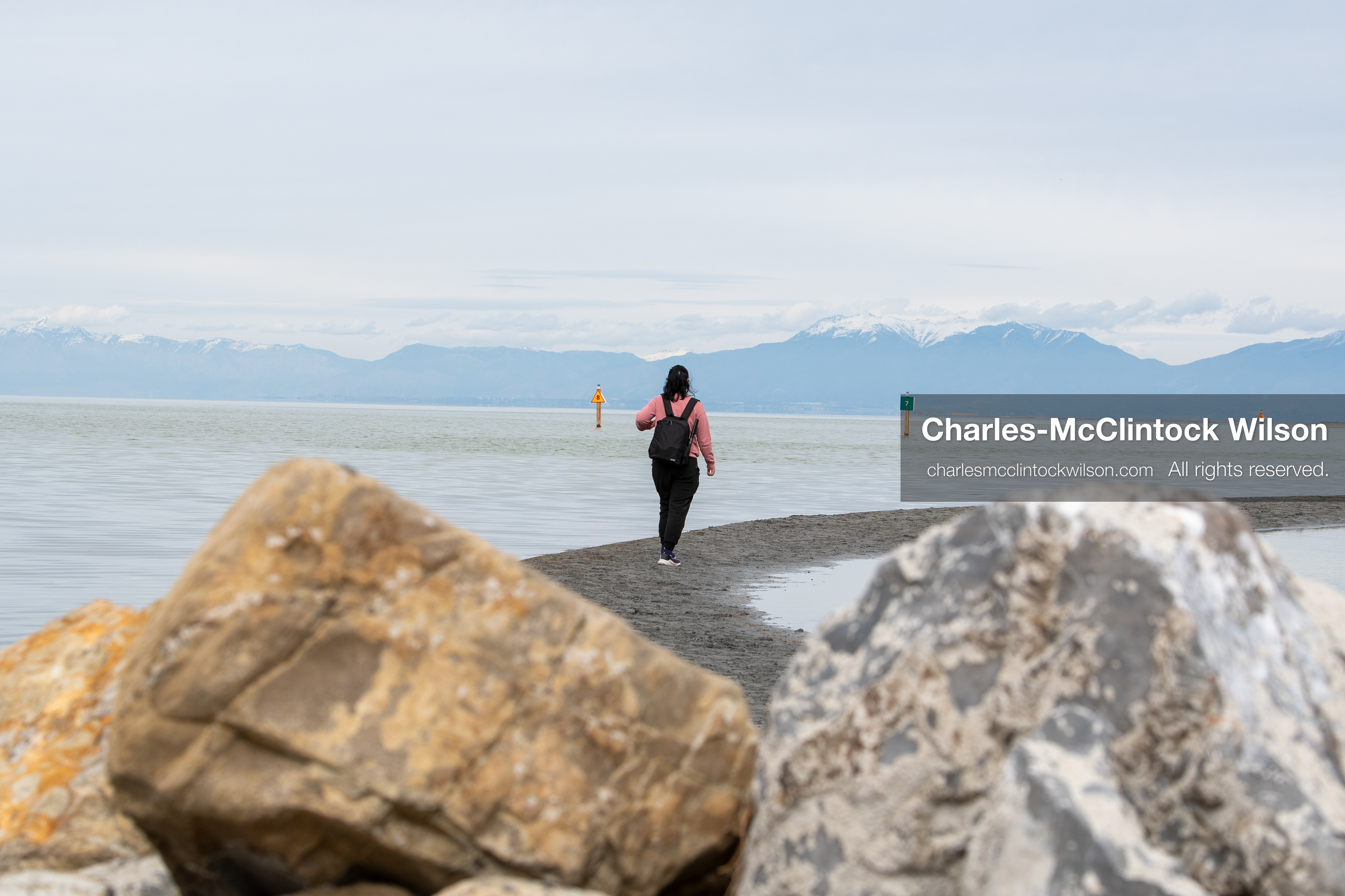 March 1, 2026, Great Salt Lake, Utah, USA: A person walks along the exposed shoreline of the Great Salt Lake as water levels in the region remain historically low. Reports from state officials and the Great Salt Lake Strike Team state that the lake continues to fall within a serious adverse‑effects range, with elevations among the lowest recorded in more than one hundred years. The lake has drawn increased public attention as lawmakers consider large‑scale water projects and long‑term plans to address declining conditions. (Credit Image: © Charles‑McClintock Wilson/ZUMA Press Wire)