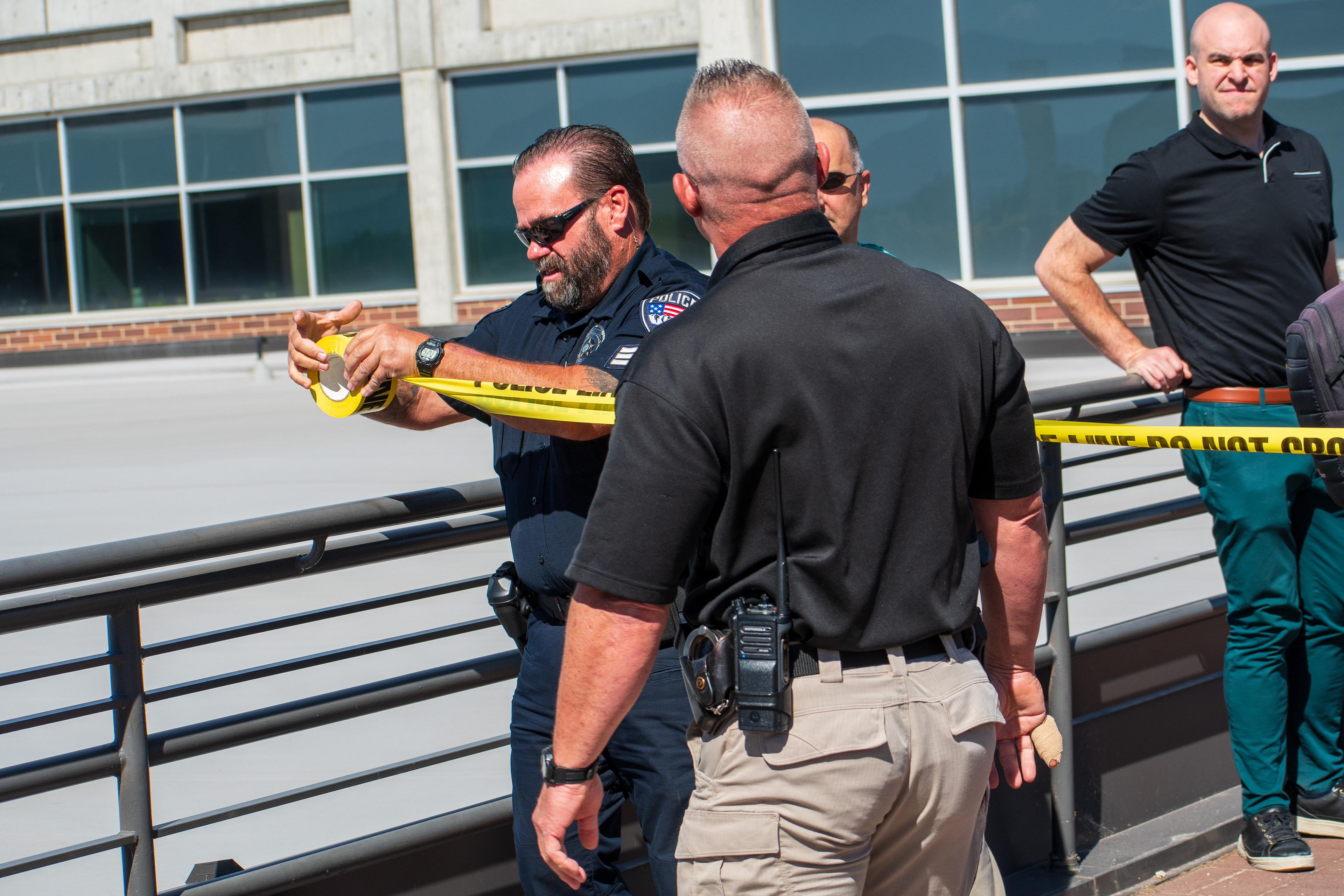 September 10, 2025 – Orem, Utah, United States: Law enforcement officers set up a perimeter with caution tape at Utah Valley University ahead of a scheduled public event featuring conservative activist Charlie Kirk. Photograph by Charles‑McClintock Wilson / ZUMA Press Wire