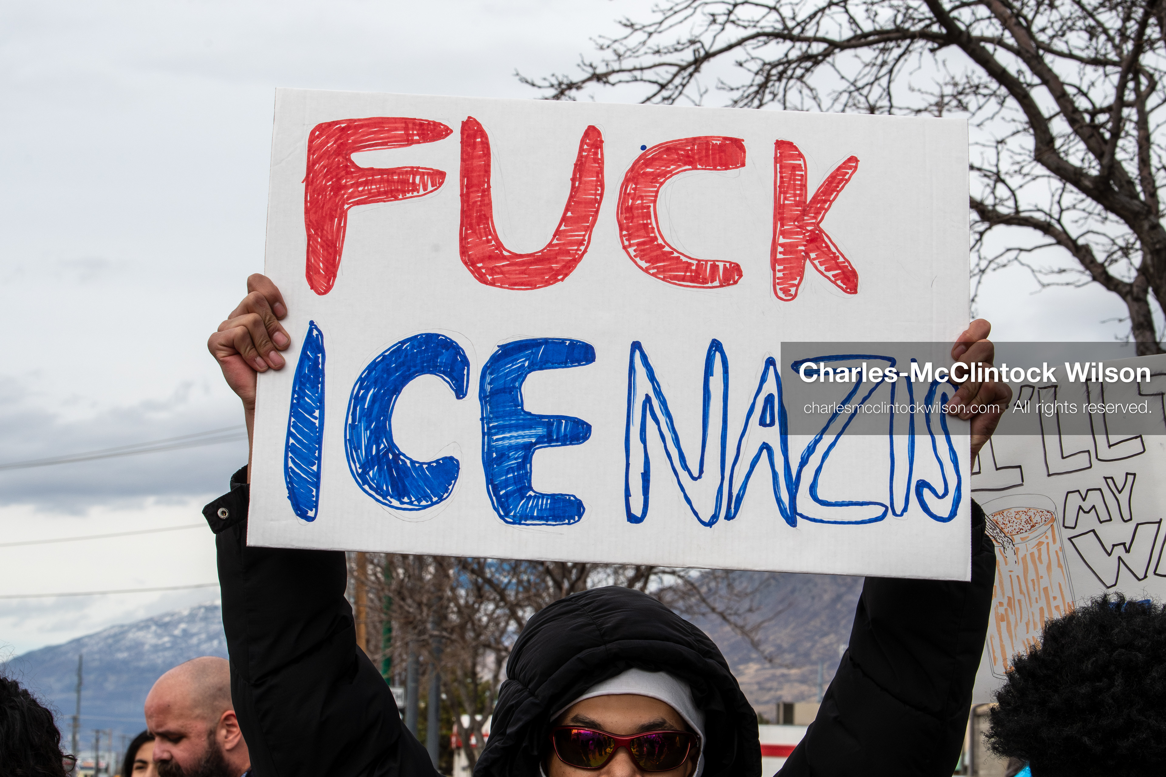 February 11, 2026, Orem, Utah, USA: A student stands along State Street during a student‑led protest involving participants from multiple Orem schools. (Credit Image: © Charles‑McClintock Wilson/ZUMA Press Wire)