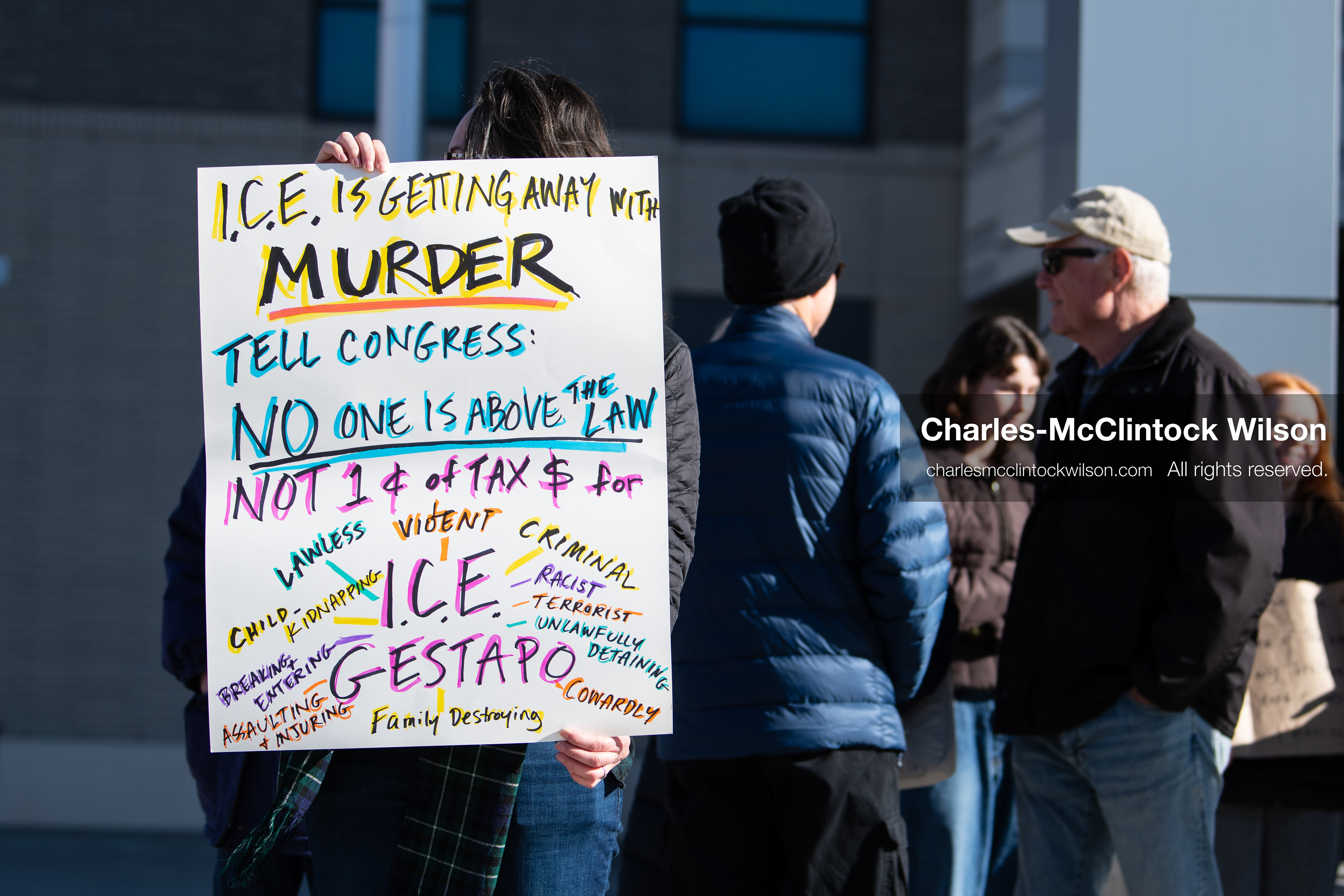 January 20, 2026, Provo, Utah, USA: A demonstrator stands outside Provo City Hall during the Free America Walkout protest in Provo Utah on January 20 2026. The nationwide event called for immigration reform and changes to detention practices. 