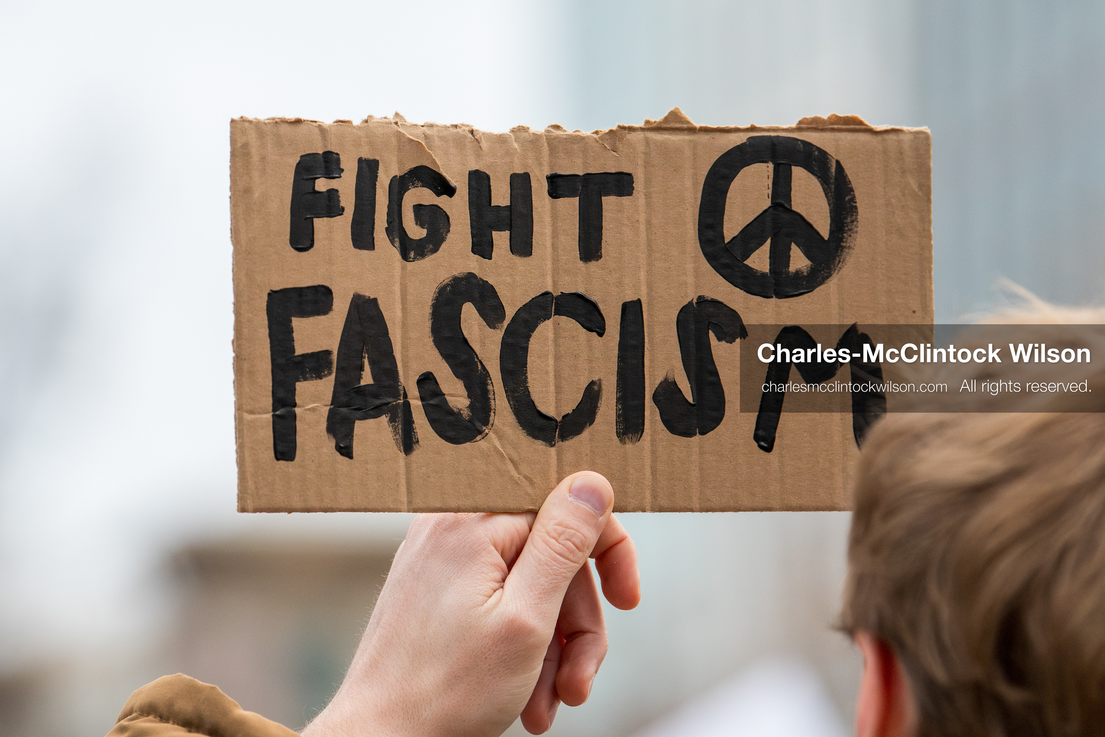 January 3, 2026, Salt Lake City, Utah, USA: A protester holds a sign during a demonstration against US action in Venezuela outside the Wallace Federal Building in Salt Lake City, Utah. The protest was part of a nationwide mobilization responding to recent military developments. (Credit Image: (c) Charles‑McClintock Wilson/ZUMA Press Wire)