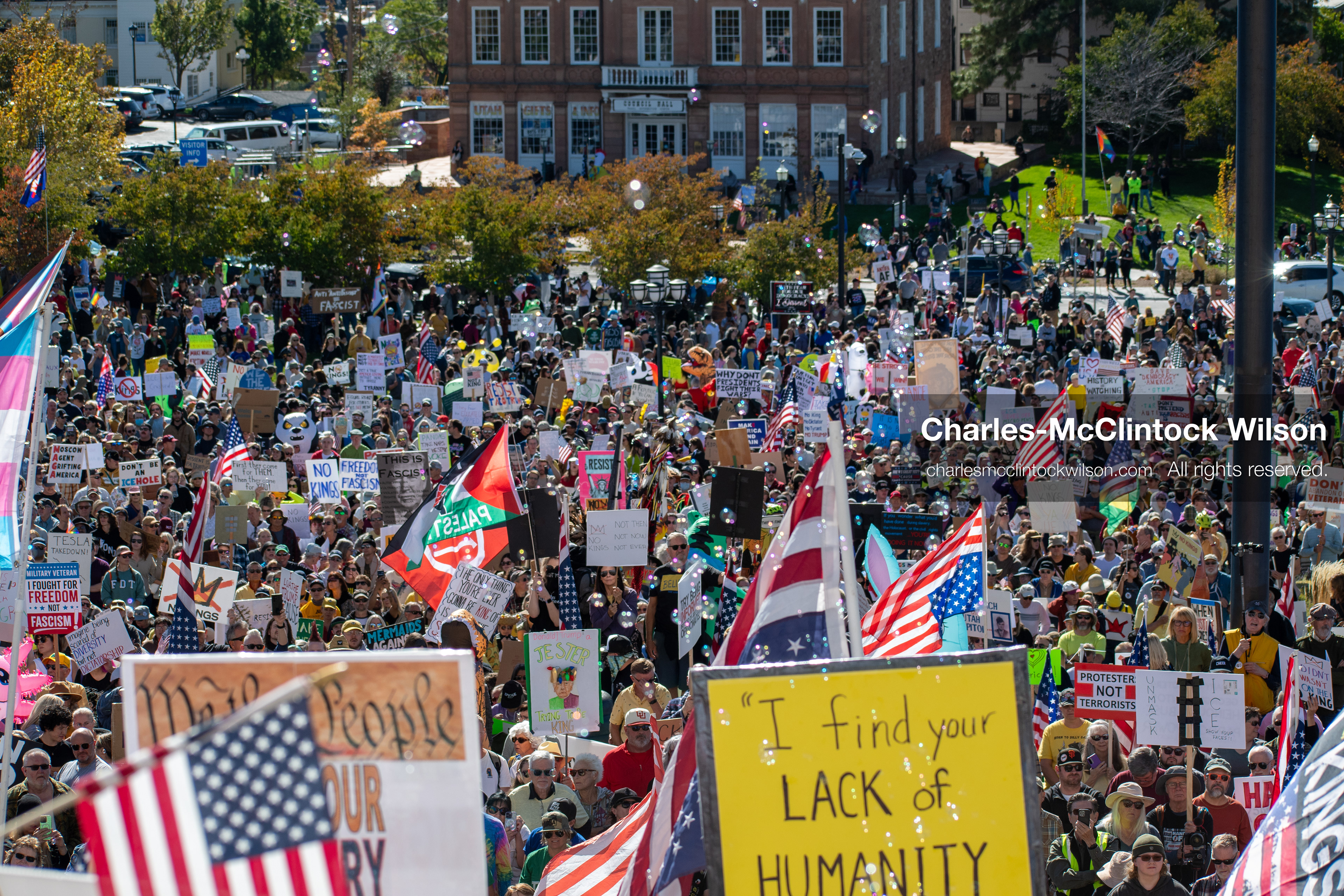 October 18, 2025, Salt Lake City, Utah, USA: Demonstrators participate in a "No Kings" protest held at the Utah State Capitol. Participants hold signs and flags during the public gathering.
