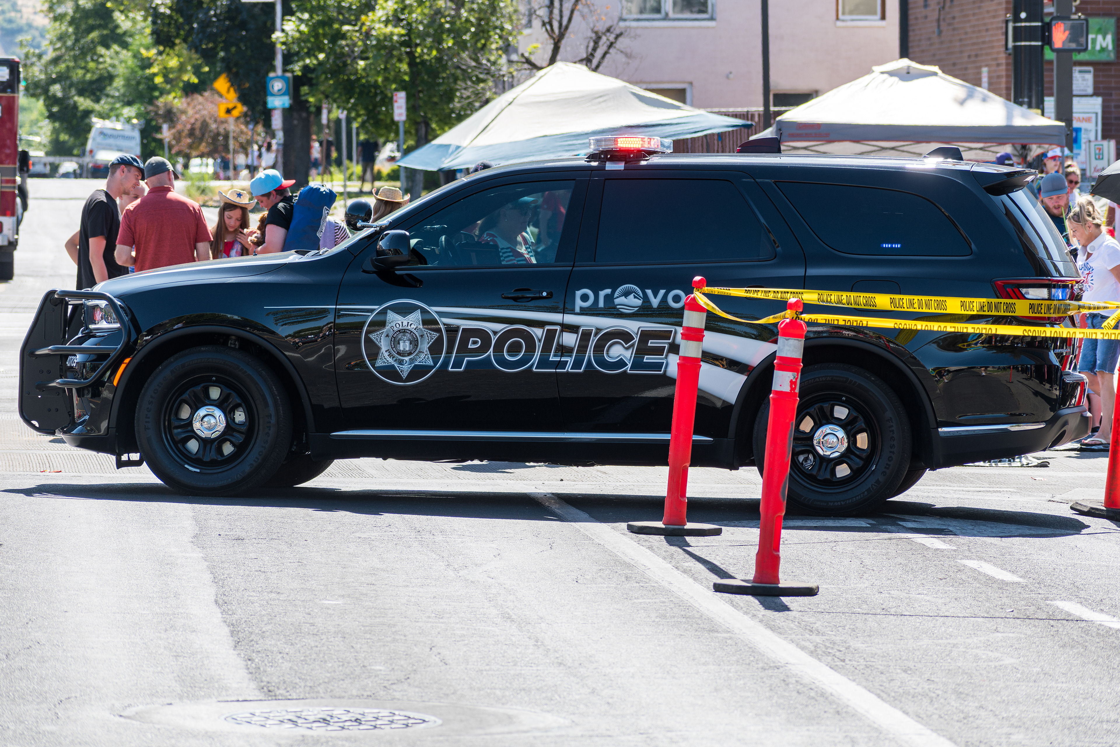 Provo, Utah – July 4, 2025: A Provo Police Department cruiser is parked on the road during the Freedom Festival Grand Parade in downtown Provo.