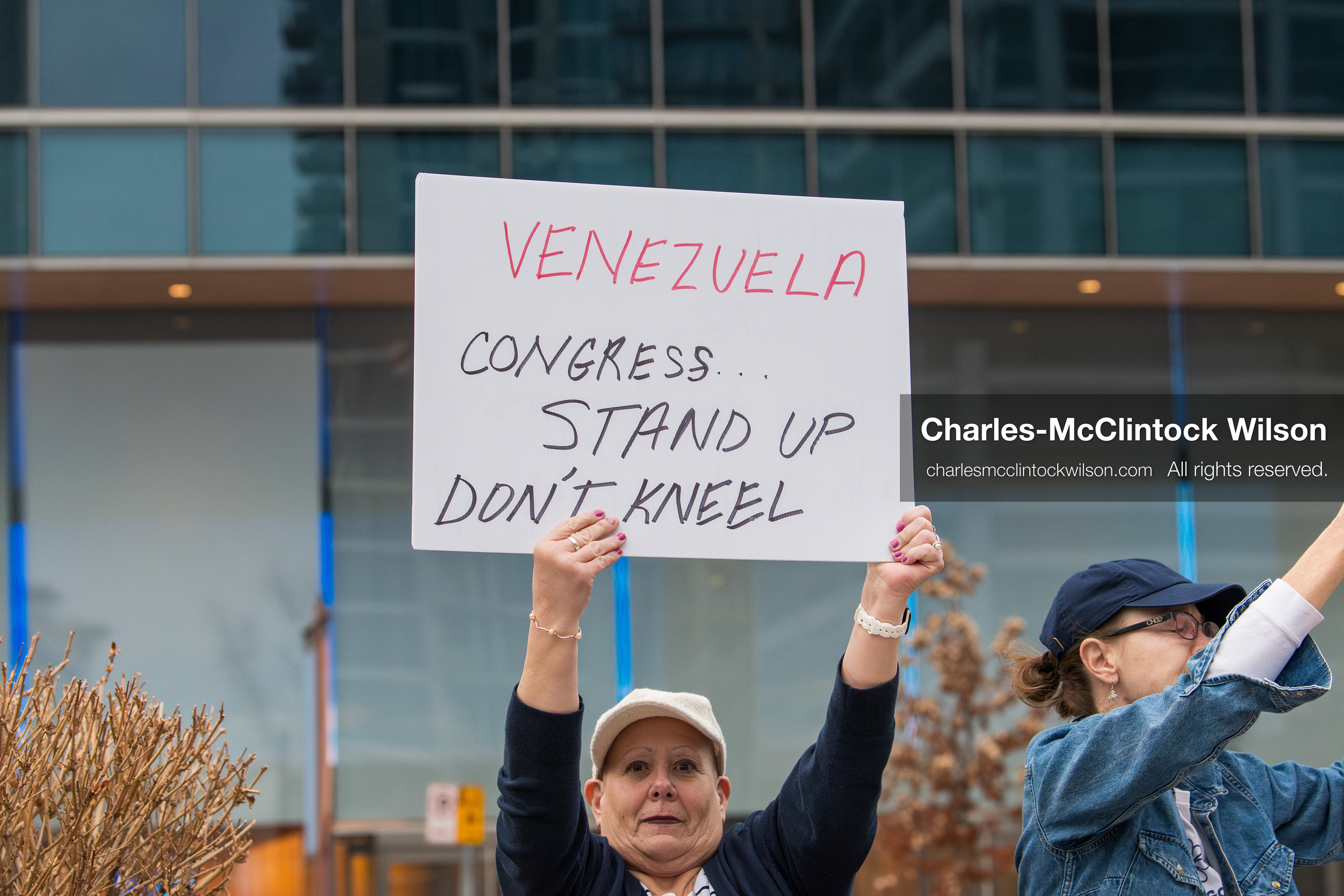 January 3, 2026, Salt Lake City, Utah, USA: A protester holds a sign during a demonstration against US action in Venezuela outside the Wallace Federal Building in Salt Lake City, Utah. The protest was part of a nationwide mobilization responding to recent military developments. (Credit Image: (c) Charles‑McClintock Wilson/ZUMA Press Wire)