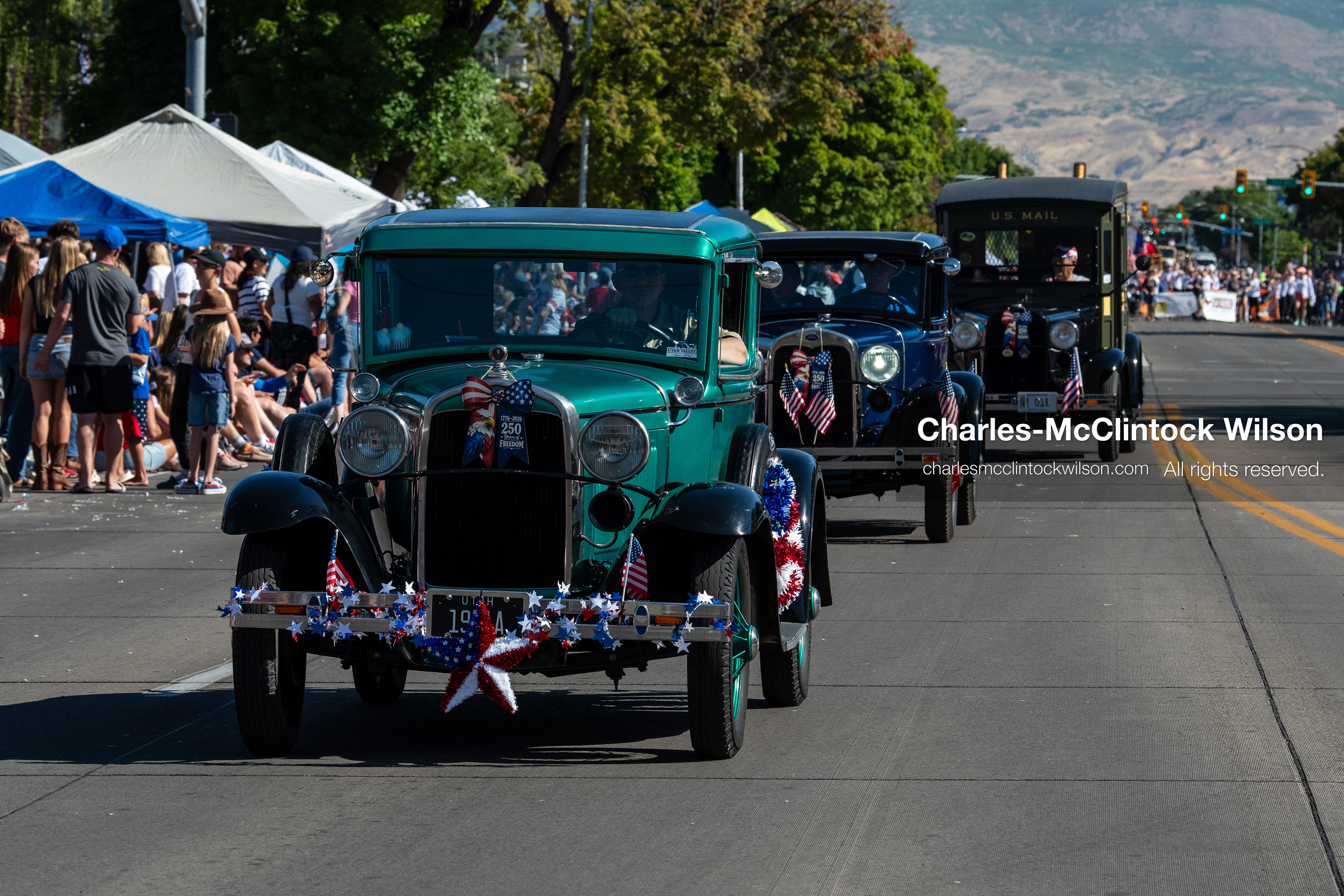 July 4, 2026, Provo, Utah, USA: Vintage classic cars drive along University Avenue past crowds lining the street during America's Freedom Festival Grand Parade in Provo, Utah, Saturday, July 4, 2026. The annual Independence Day event features expanded programming to honor the 250th anniversary of United States independence. (Credit Image: © Charles-McClintock Wilson/ZUMA Press Wire)