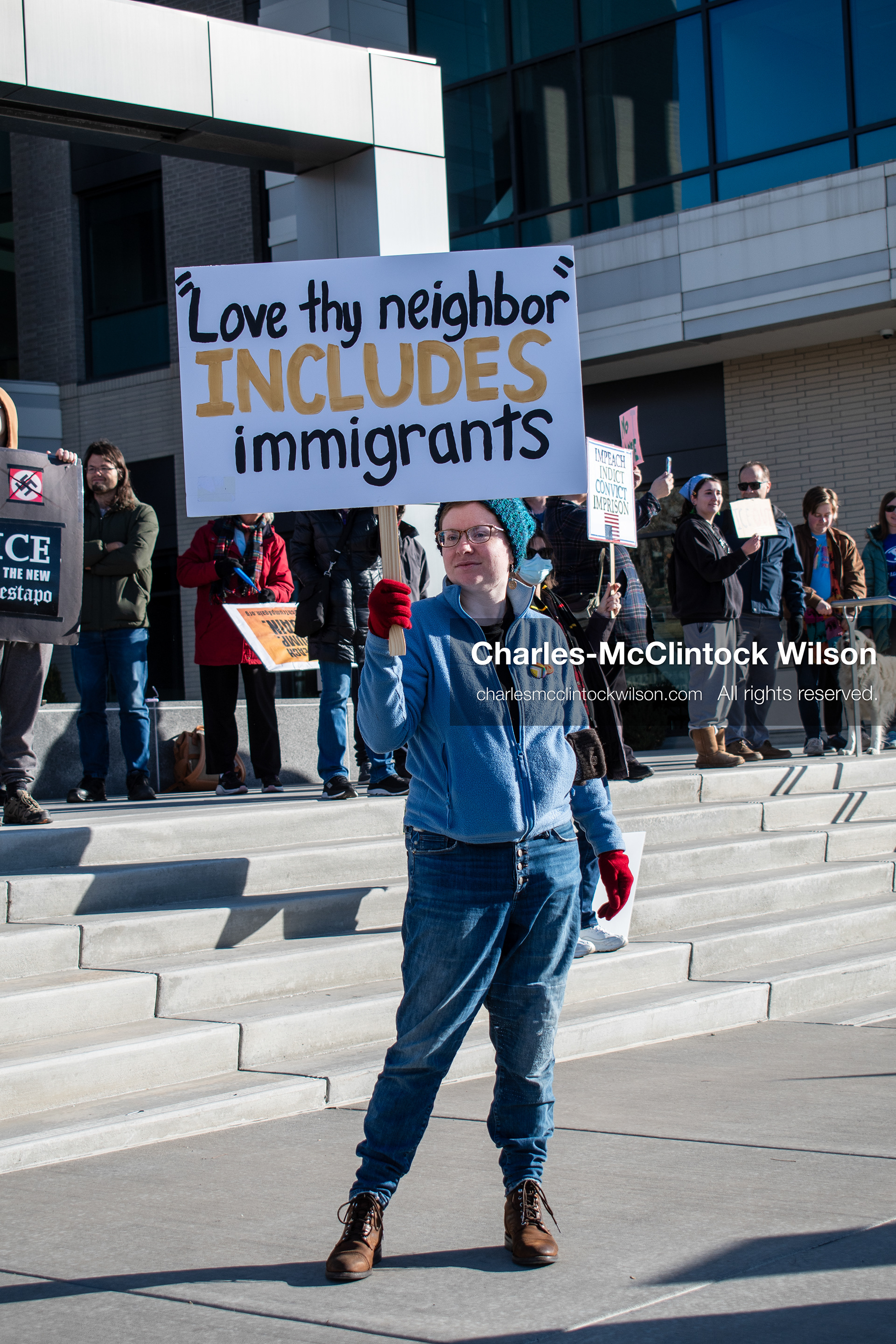 January 20, 2026, Provo, Utah, USA: A demonstrator stands outside Provo City Hall during the Free America Walkout protest in Provo Utah on January 20 2026. The nationwide event called for immigration reform and changes to detention practices. 