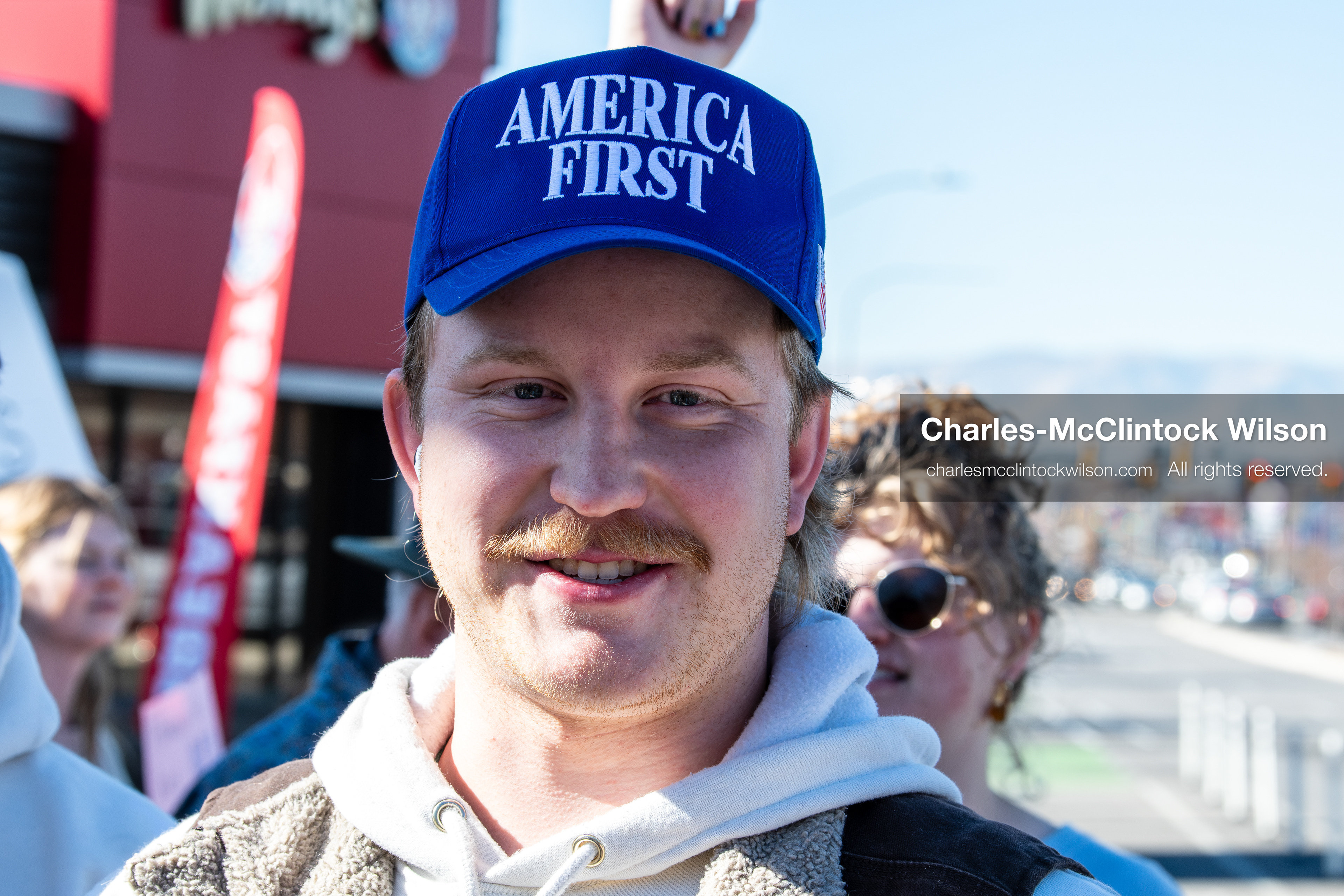 February 5, 2026, Provo, Utah, USA: A person wearing an America First hat stands near Brigham Young University in Provo during a protest opposing the presence of US Customs and Border Protection recruiters at a career fair held on the BYU campus. (Credit Image: © Charles McClintock Wilson/ZUMA Press Wire)