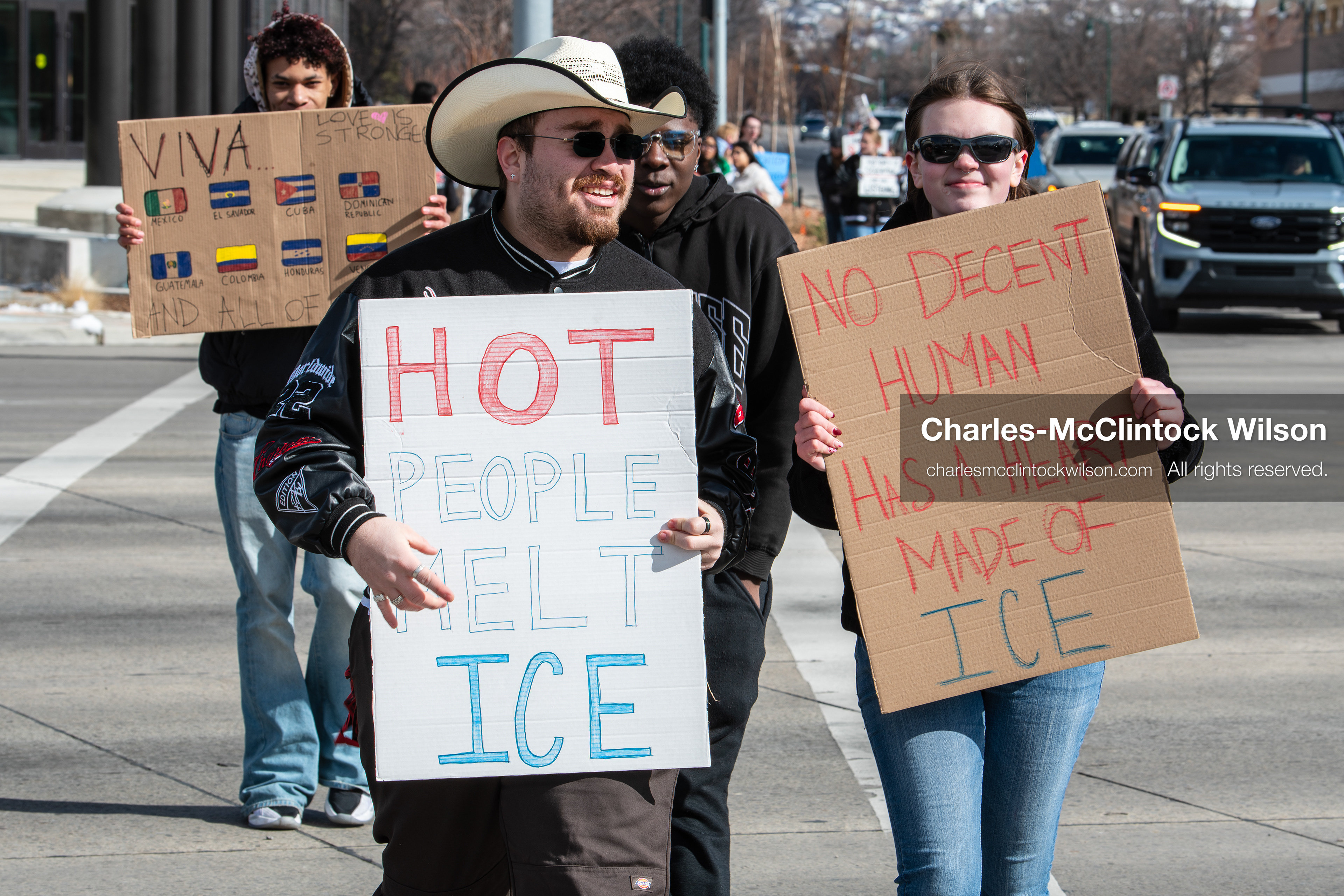 February 20, 2026, Orem, Utah, USA: Participants cross State Street in front of Orem City Hall during a student led protest against ICE. Demonstrators move through the crosswalk as vehicles wait in the area. (Credit Image: © Charles McClintock Wilson/ZUMA Press Wire)