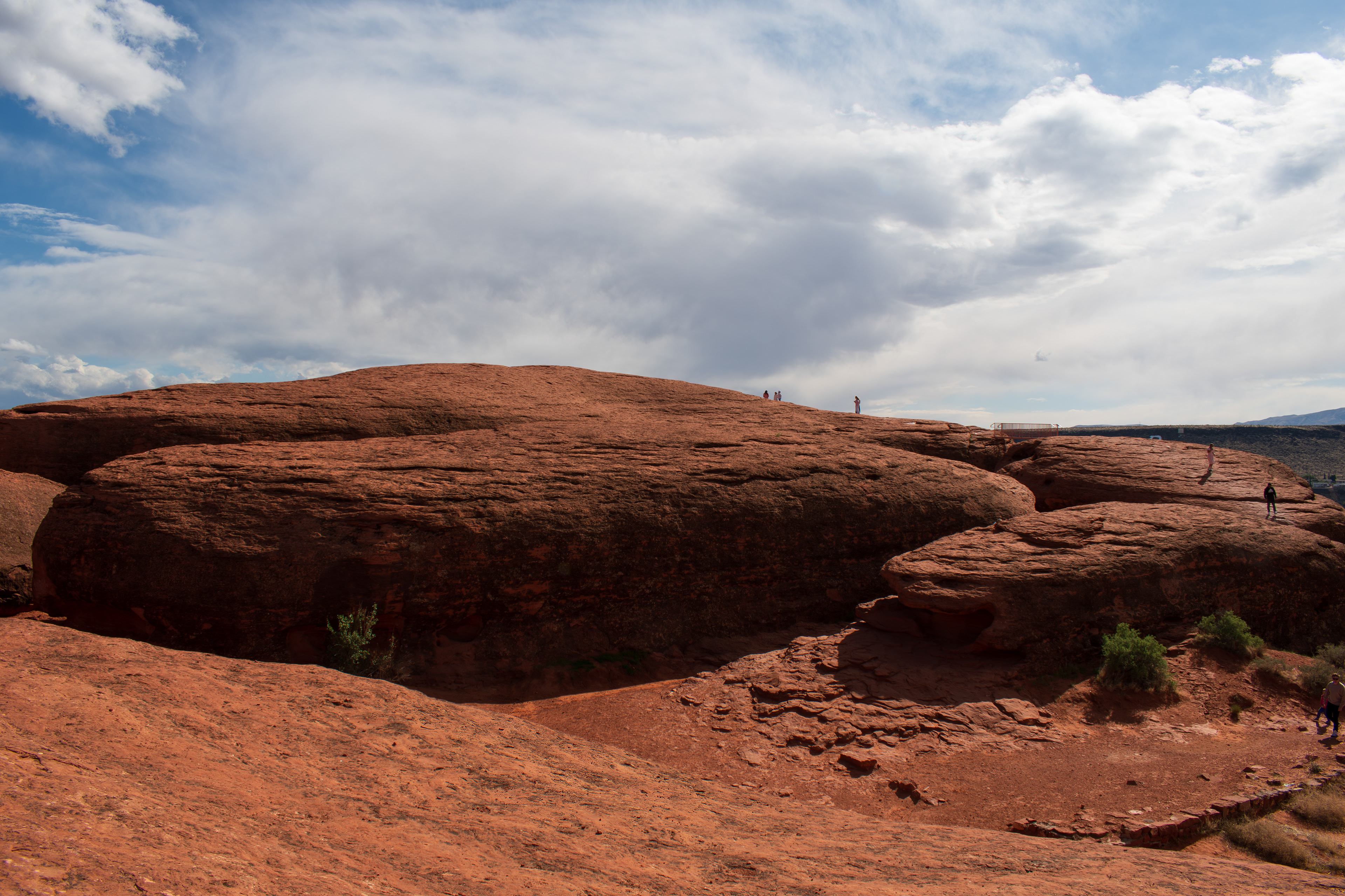 ST. GEORGE, UTAH, USA – MAY 5, 2025: Natural sandstone formations and arid terrain at Pioneer Park, a scenic public space in St. George, Utah, known for its red rock landscapes and hiking trails.