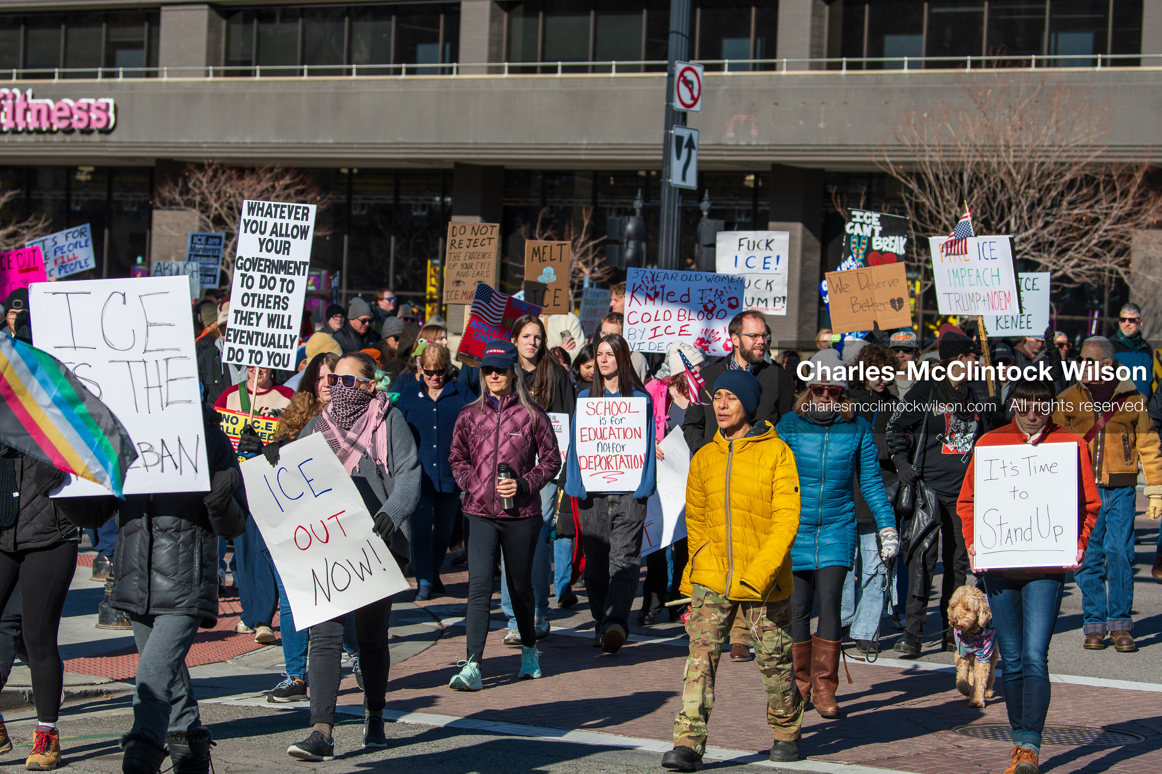 Salt Lake City, Utah, January 10, 2026: A group of demonstrators marches through downtown Salt Lake City during the ICE Out for Good protest, which began at Washington Square Park, with participants carrying signs and personal items as they walk together. (Credit Image: © Charles‑McClintock Wilson/ZUMA Press Wire)