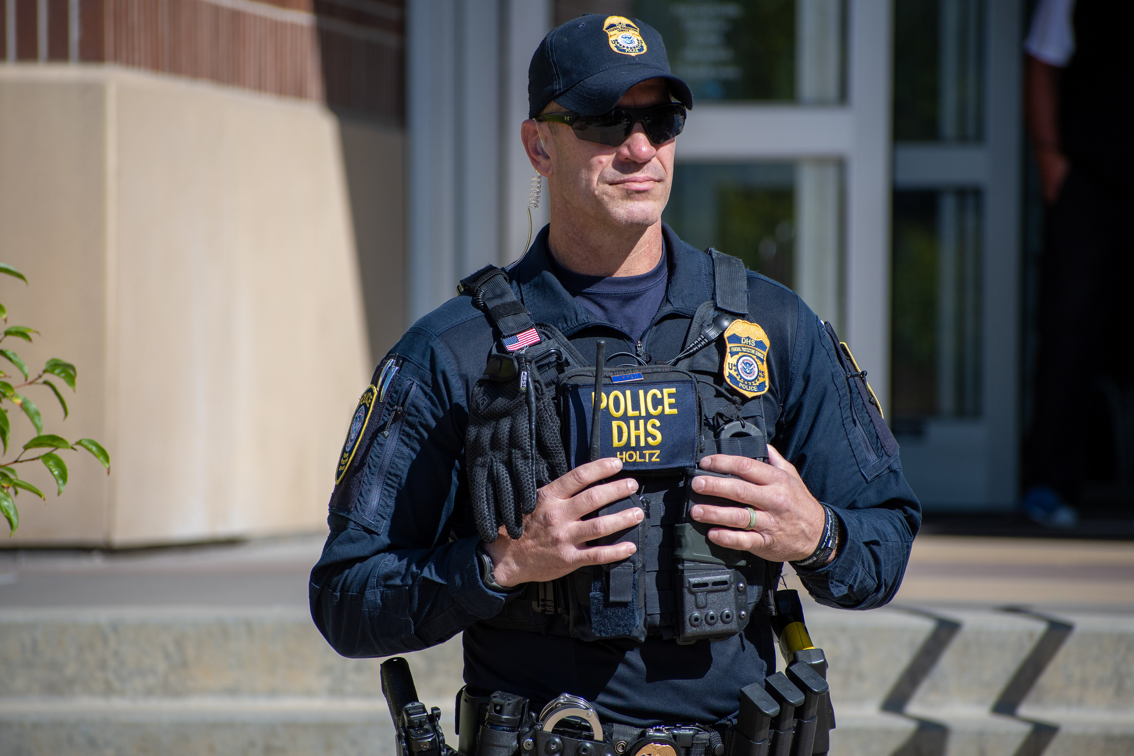 September 15, 2025 – Provo, Utah, United States: A Homeland Security police officer stands outside the Utah Valley Convention Center during a Department of Homeland Security career expo focused on recruiting law enforcement and security personnel. Photograph by Charles‑McClintock Wilson / ZUMA Press Wire