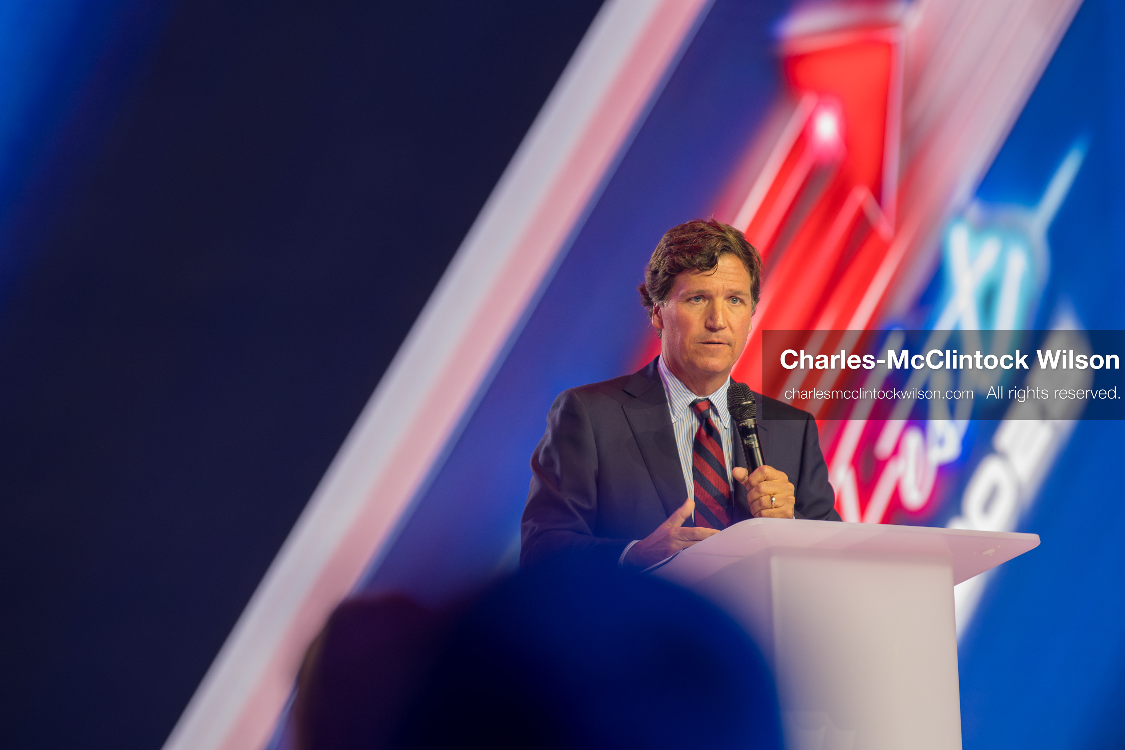 December 18, 2025, Phoenix, Arizona, USA: Tucker Carlson speaks on Day One of Turning Point USA’s AmericaFest 2025 at the Phoenix Convention Center in Phoenix, Arizona.   (Credit Image: © Charles‑McClintock Wilson/ZUMA Press Wire)