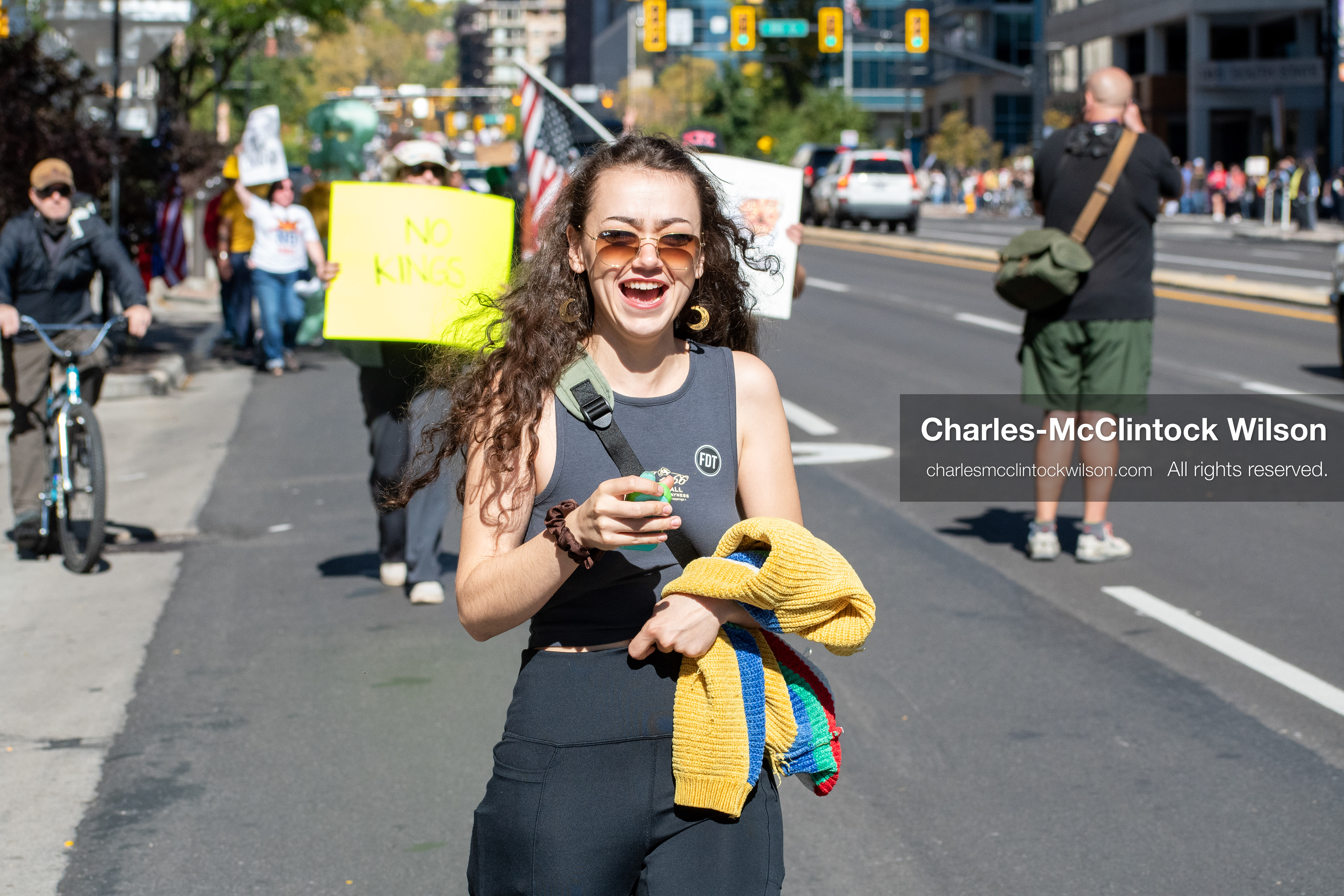 October 18, 2025, Salt Lake City, Utah, USA: Demonstrators march along South State Street during a "No Kings" protest in Salt Lake City, Utah. The protest was part of a nationwide mobilization.