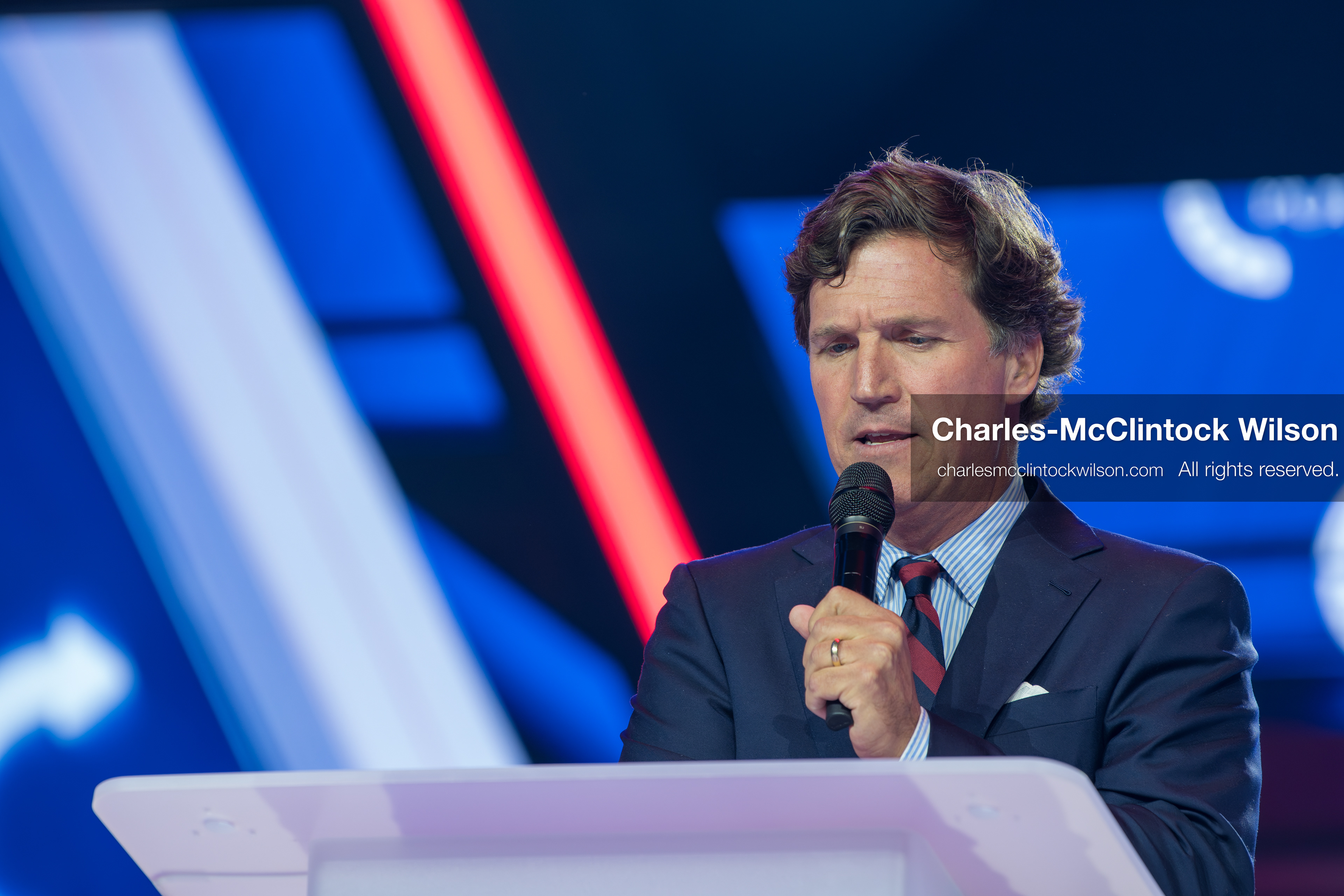 December 18, 2025, Phoenix, Arizona, USA: Tucker Carlson speaks on Day One of Turning Point USA’s AmericaFest 2025 at the Phoenix Convention Center in Phoenix, Arizona.   (Credit Image: © Charles‑McClintock Wilson/ZUMA Press Wire)