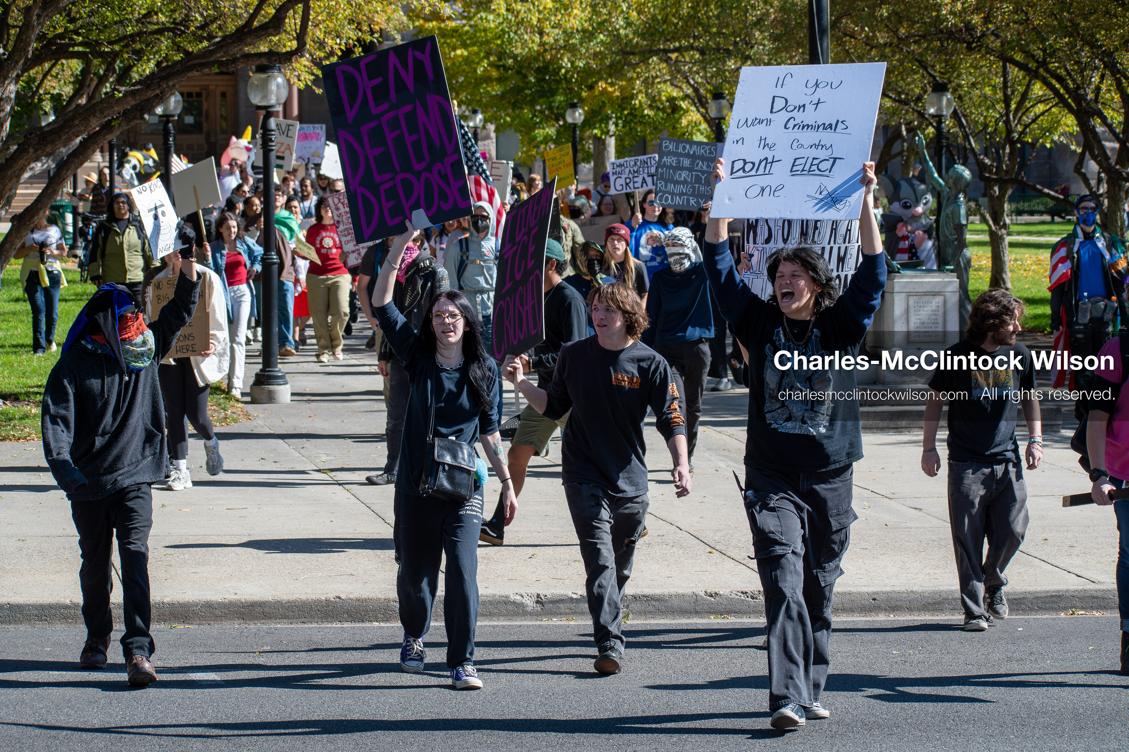 October 18, 2025, Salt Lake City, Utah, USA: Demonstrators march along South State Street during a "No Kings" protest in Salt Lake City, Utah. The protest was part of a nationwide mobilization.