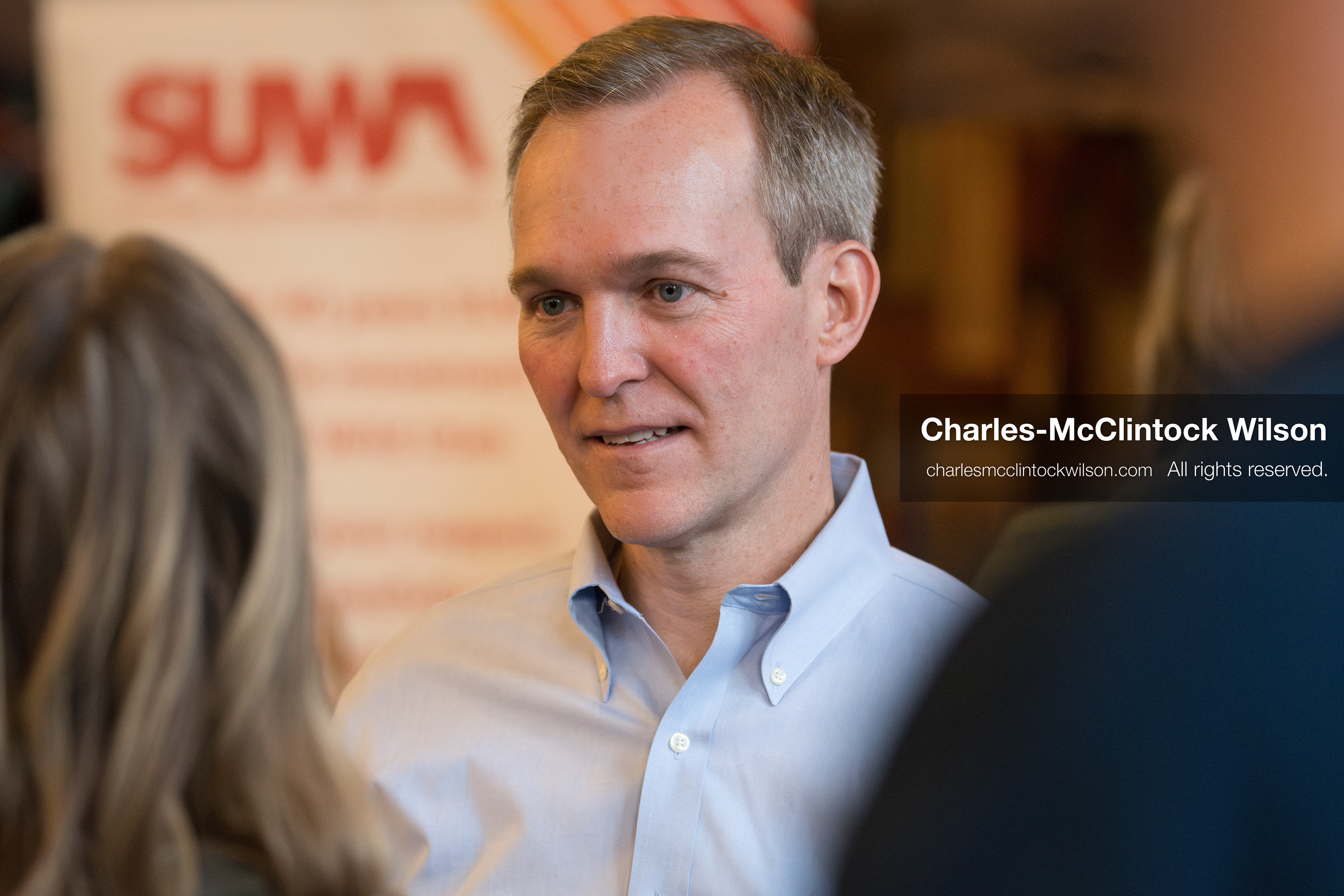 April 22, 2026, Salt Lake City, Utah, USA: Democratic congressional candidate BEN McADAMS speaks with attendees before the Earth Day 1st District Candidate Debate at Church and State Marketplace. The event, hosted by Stewardship Utah, brought together candidates to discuss environmental and policy issues ahead of the 2026 election. (Credit Image: © Charles-McClintock Wilson/ZUMA Press Wire)