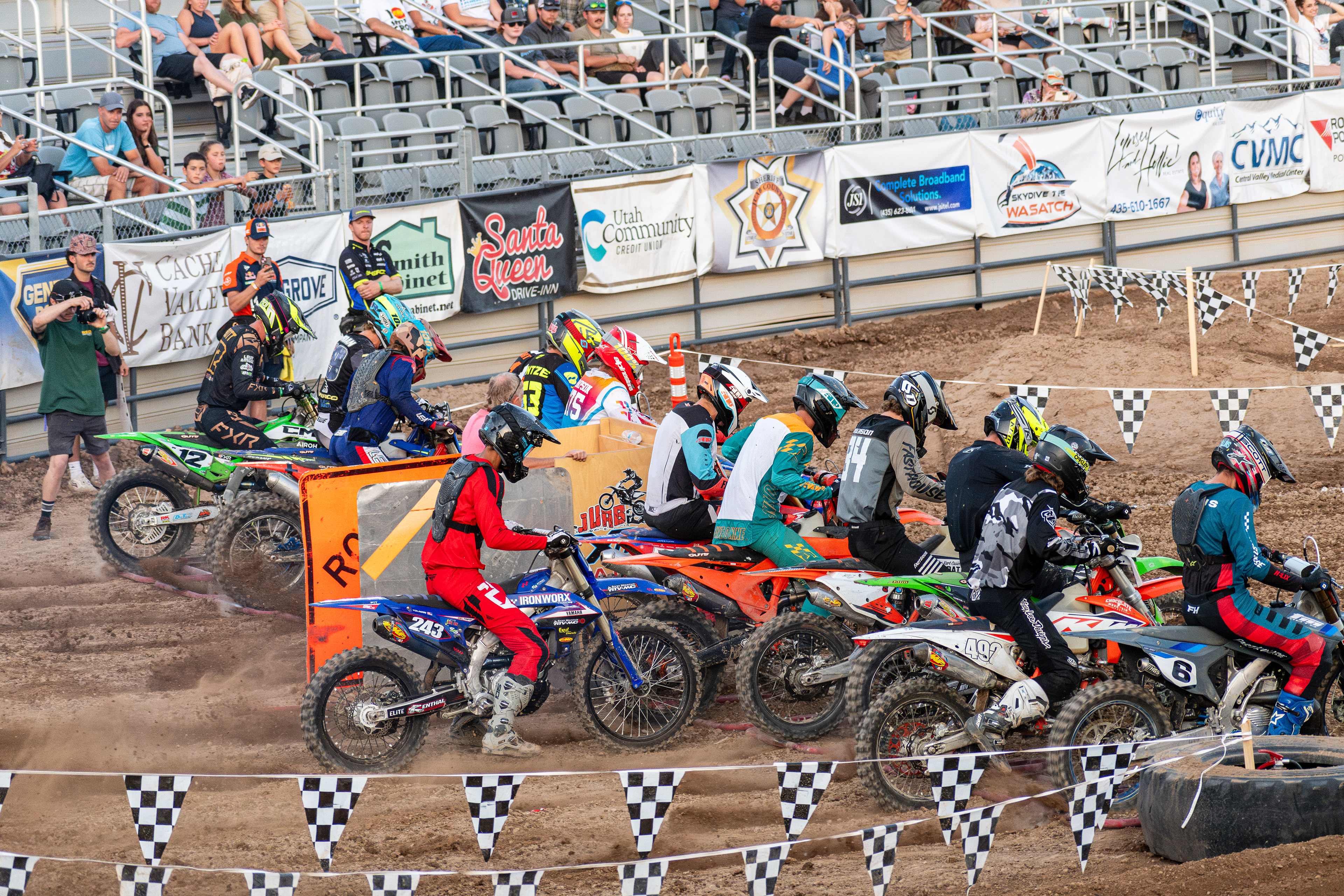 Nephi, Utah – June 28, 2025: Motocross competitors prepare to take off at the starting line during the Juab Xtreme Racing event in central Utah.