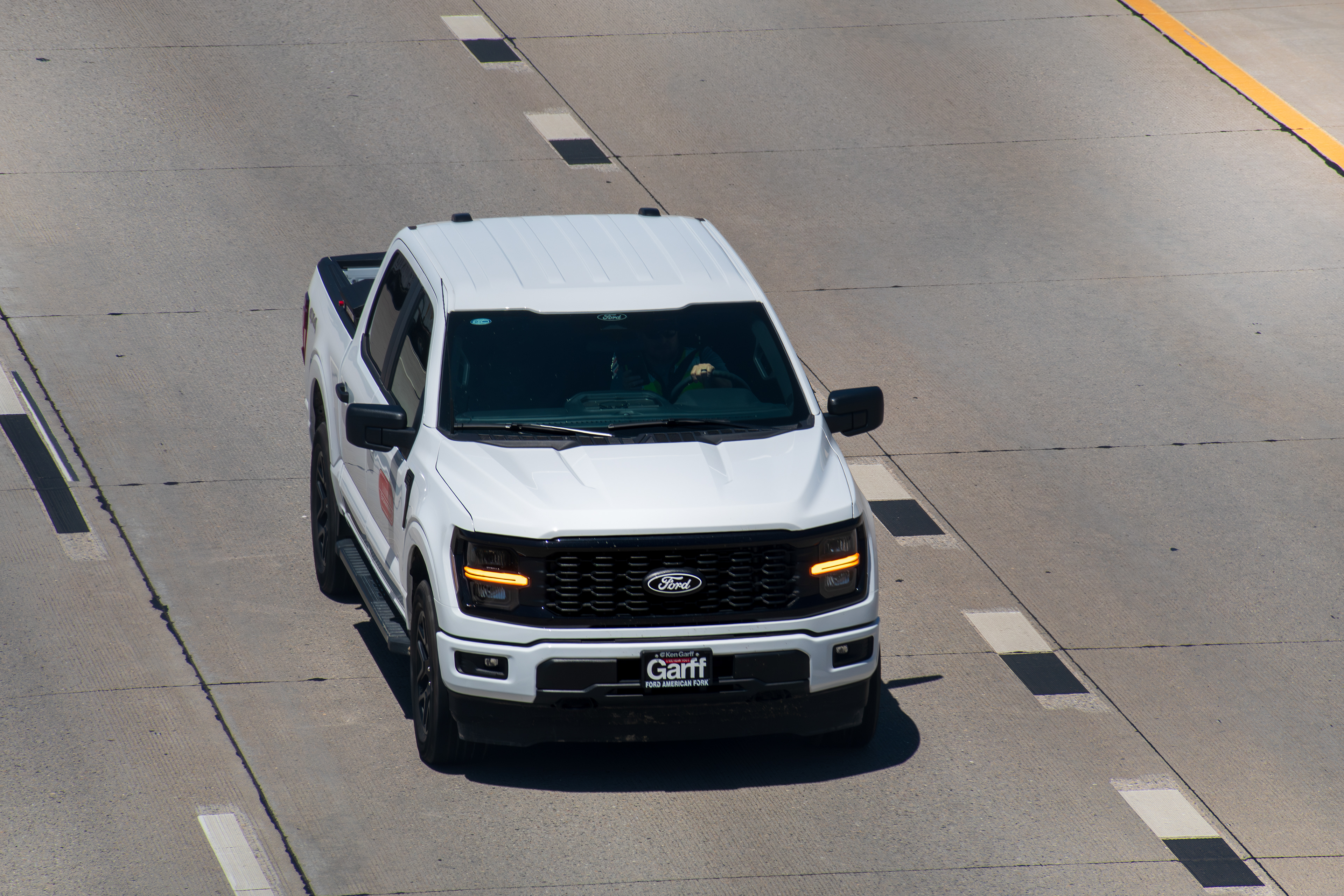 Orem, Utah – June 2, 2025: A pickup truck travels southbound on Interstate 15 toward Provo in Orem, Utah, United States.