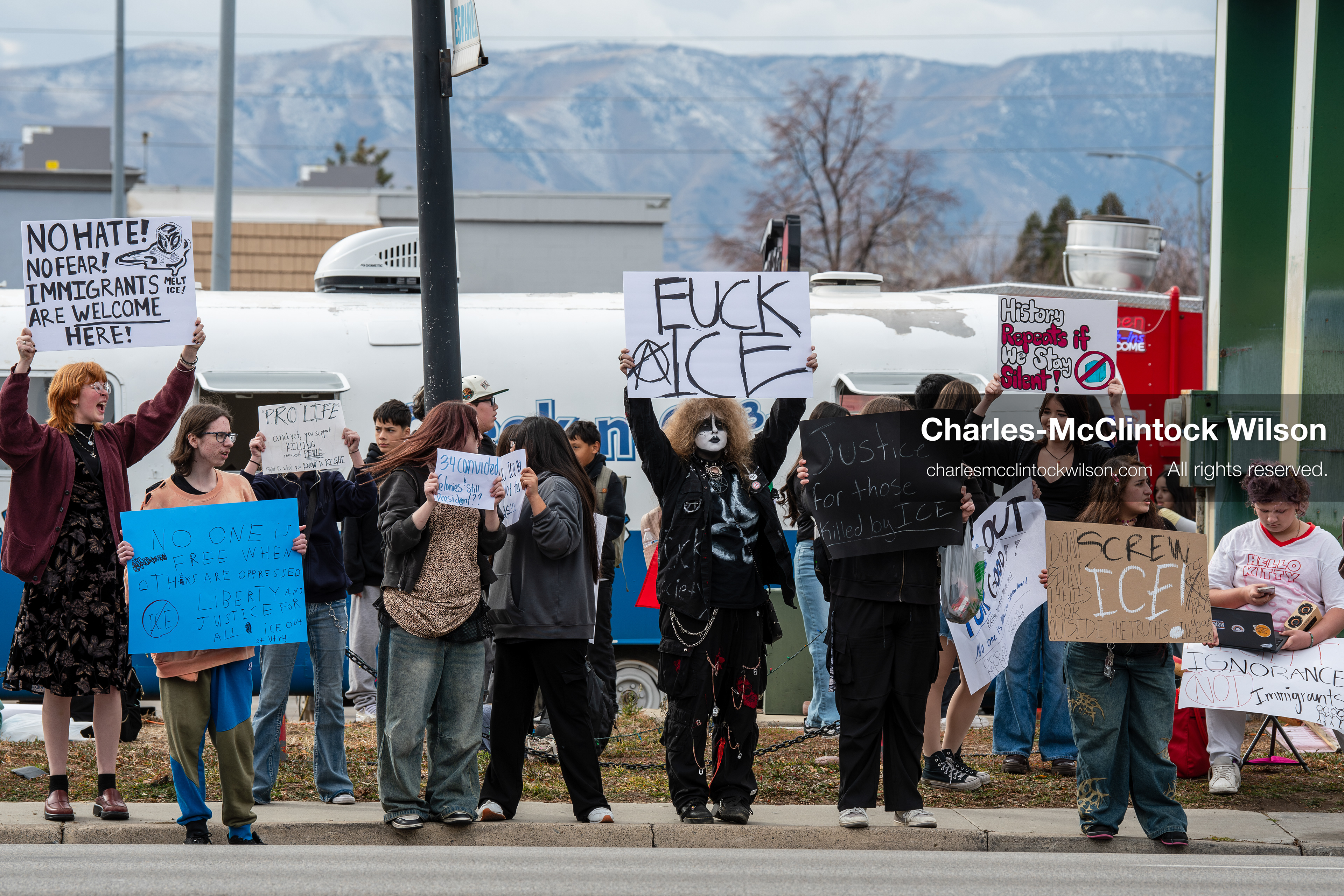 February 11, 2026, Orem, Utah, USA: Students stand on the sidewalk along State Street during a student‑led protest involving participants from multiple Orem schools. (Credit Image: © Charles‑McClintock Wilson/ZUMA Press Wire)